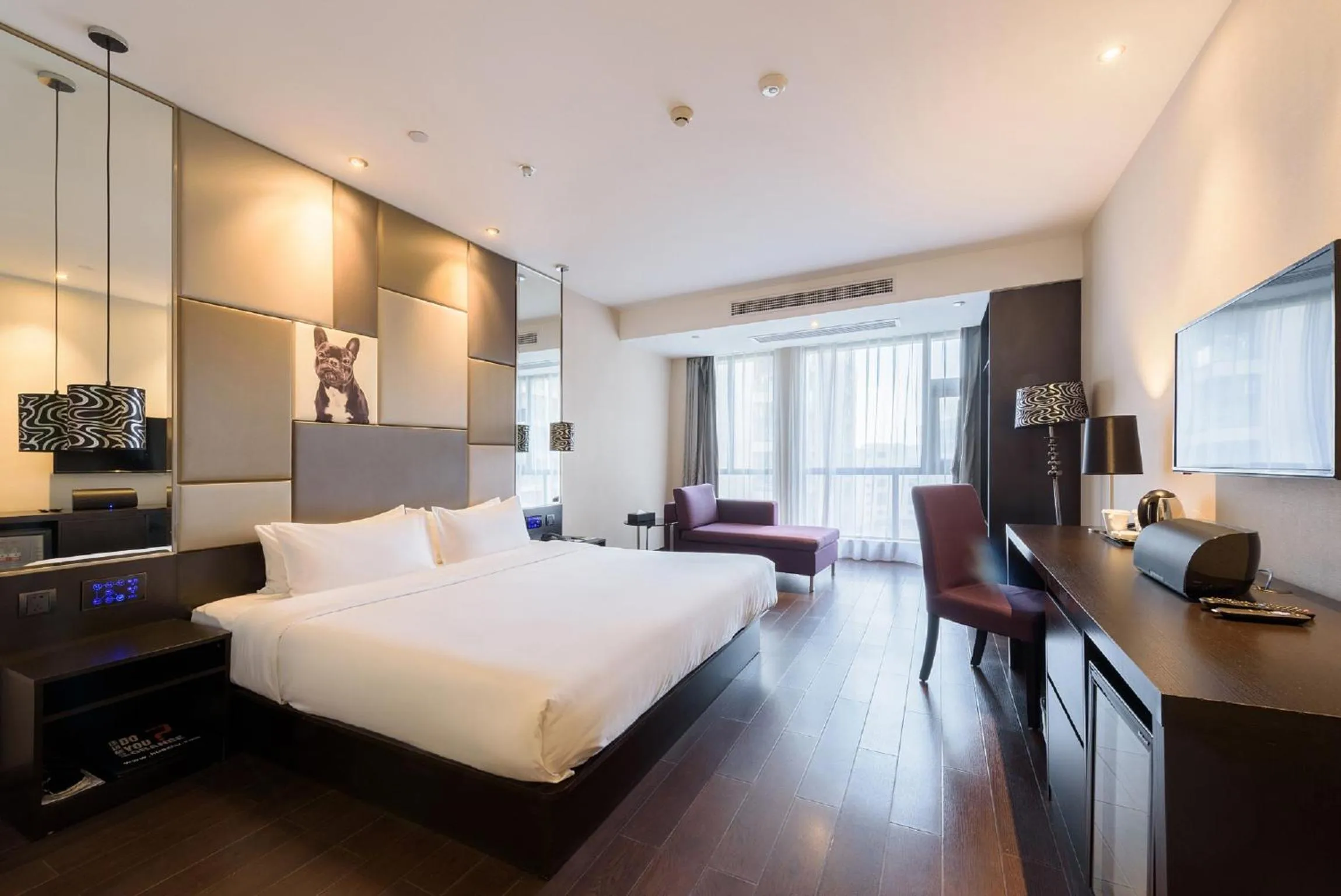 Bed in Orange Hotel Hangzhou Jiubao Passenger Transport Center