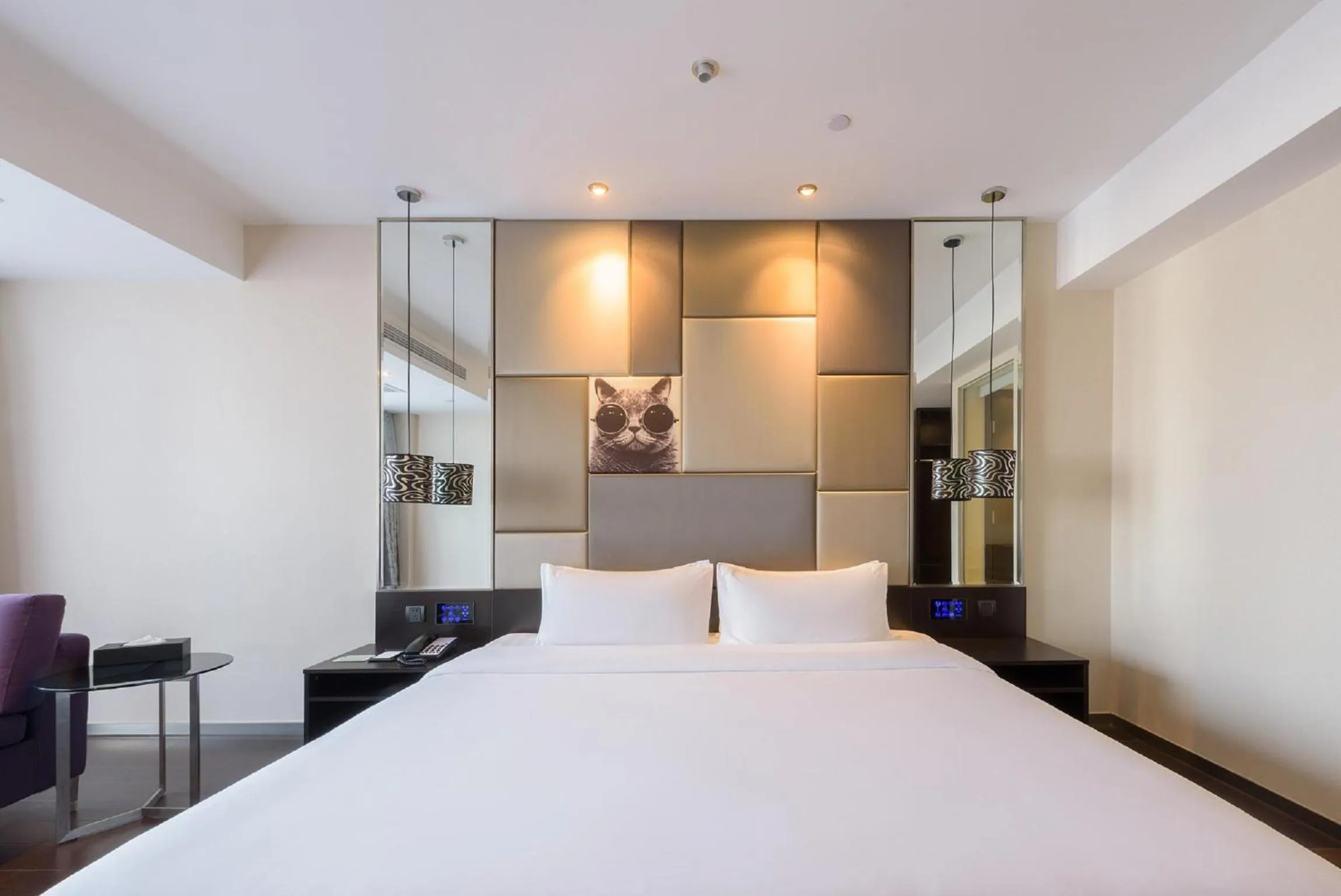 Bed in Orange Hotel Hangzhou Jiubao Passenger Transport Center