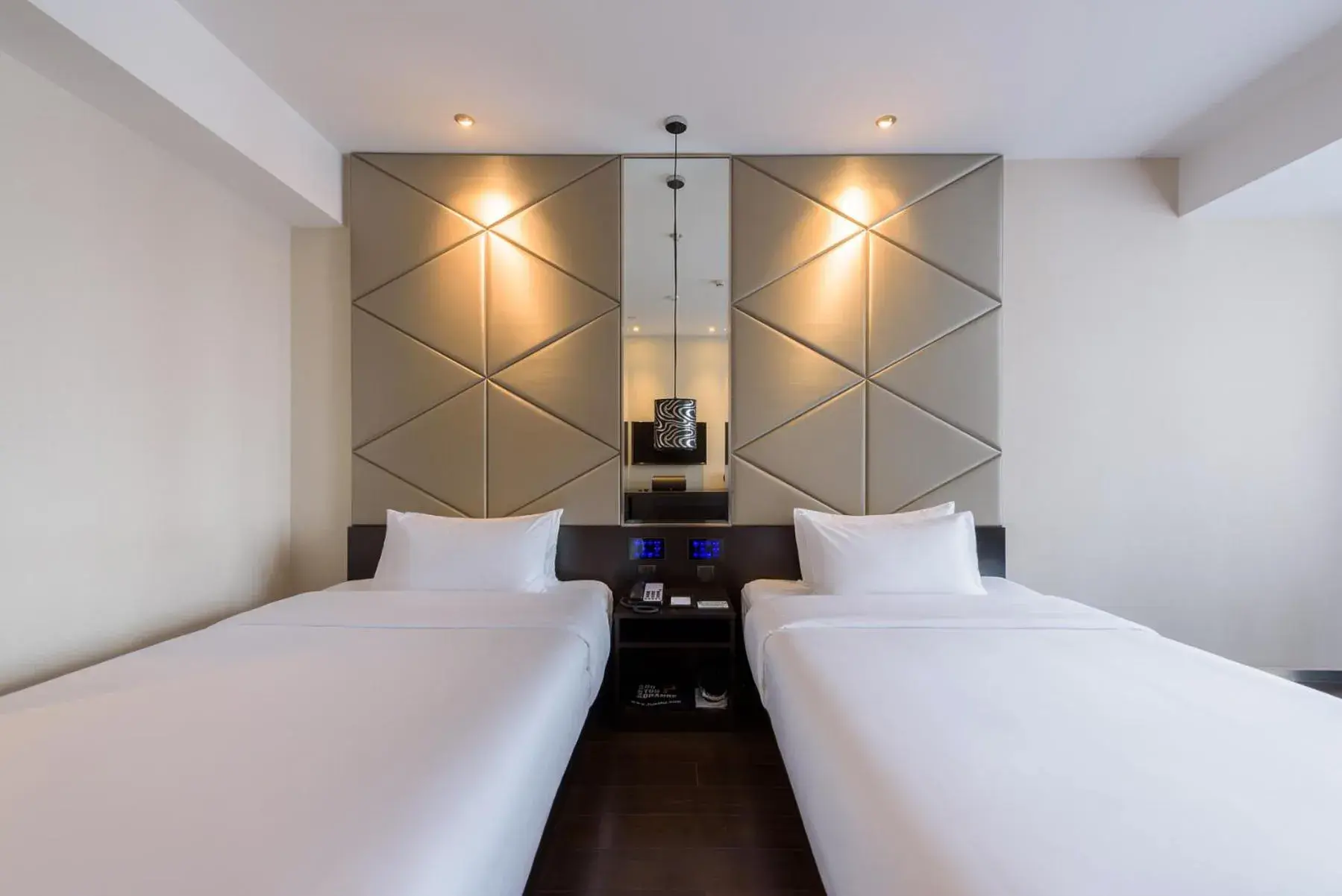 Bed in Orange Hotel Hangzhou Jiubao Passenger Transport Center Bed in Orange Hotel Hangzhou Jiubao Passenger Transport Center