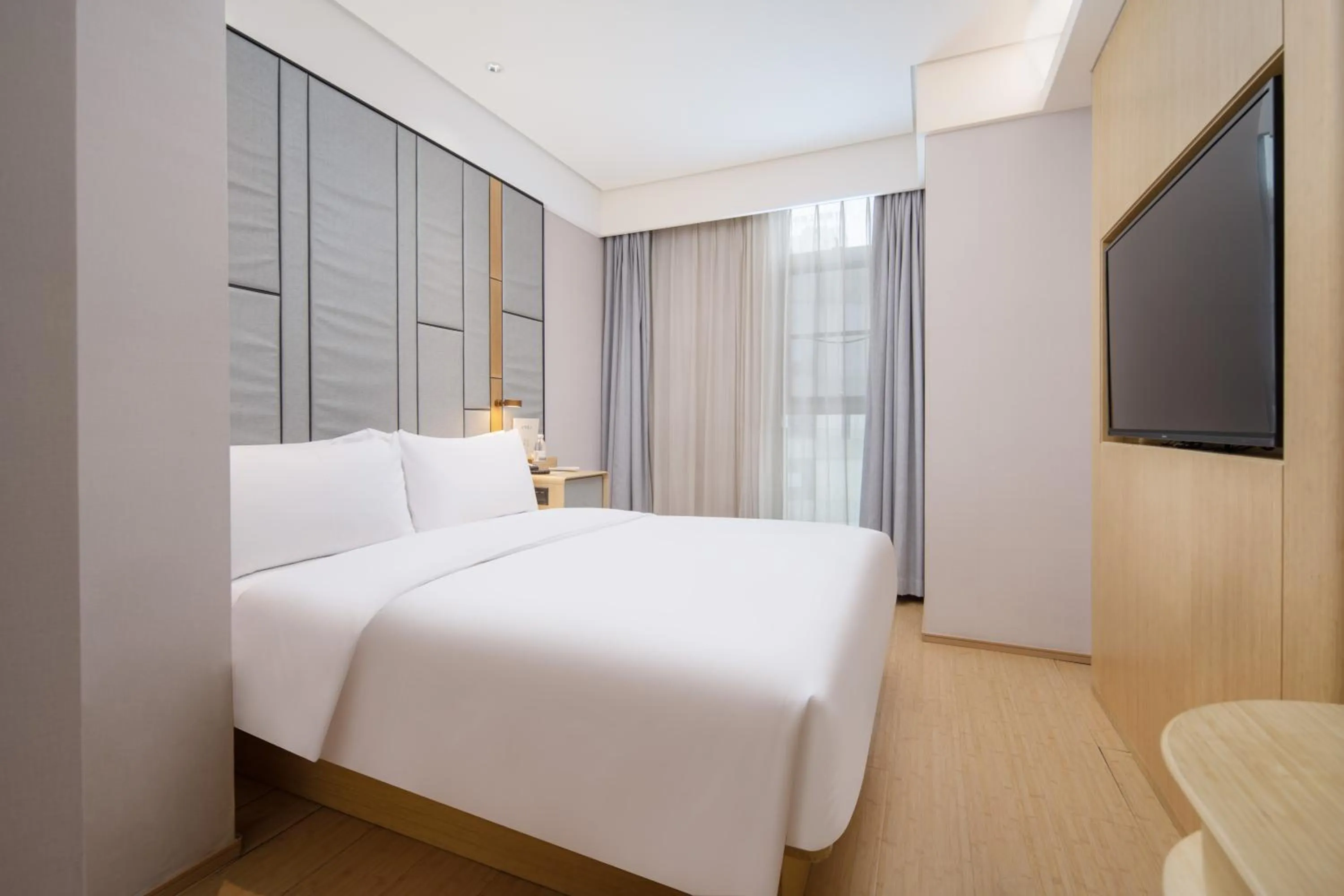 Bed in JI Hotel Chongqing Liangjiang Happiness Plaza