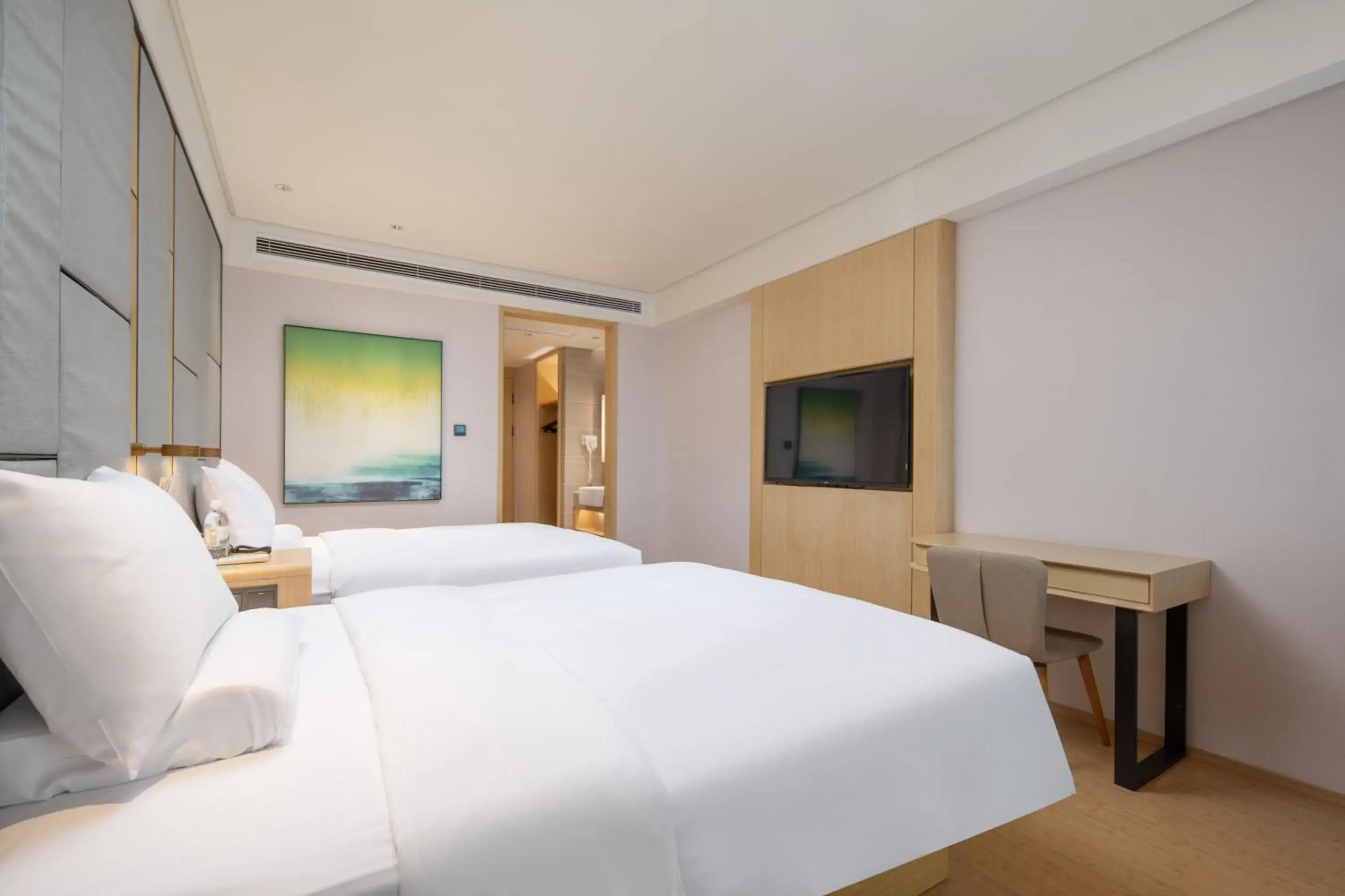 Bed in JI Hotel Chongqing Liangjiang Happiness Plaza Bed in JI Hotel Chongqing Liangjiang Happiness Plaza