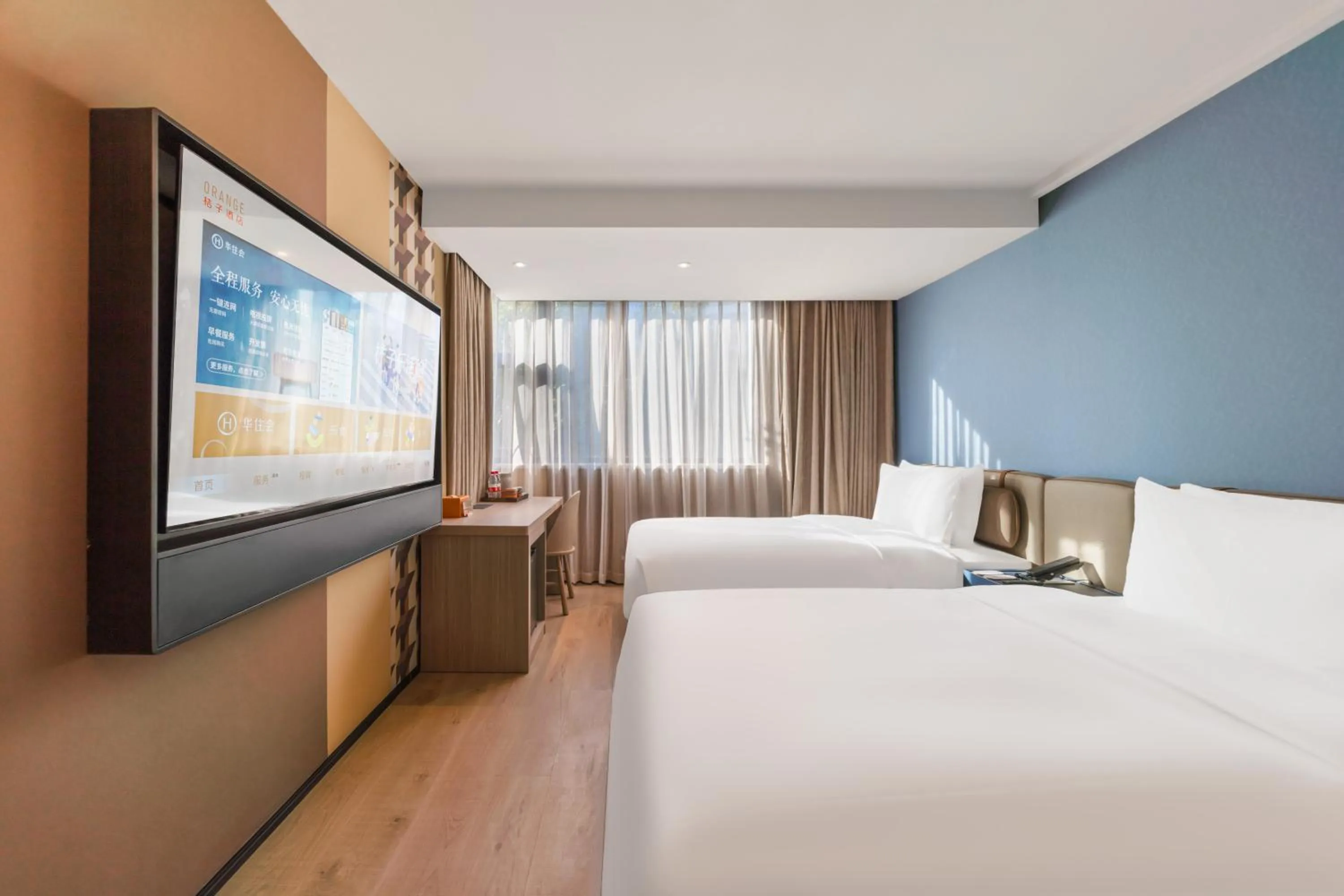 Bed in Orange Hotel Guangzhou Tianhe Gangding Subway Station