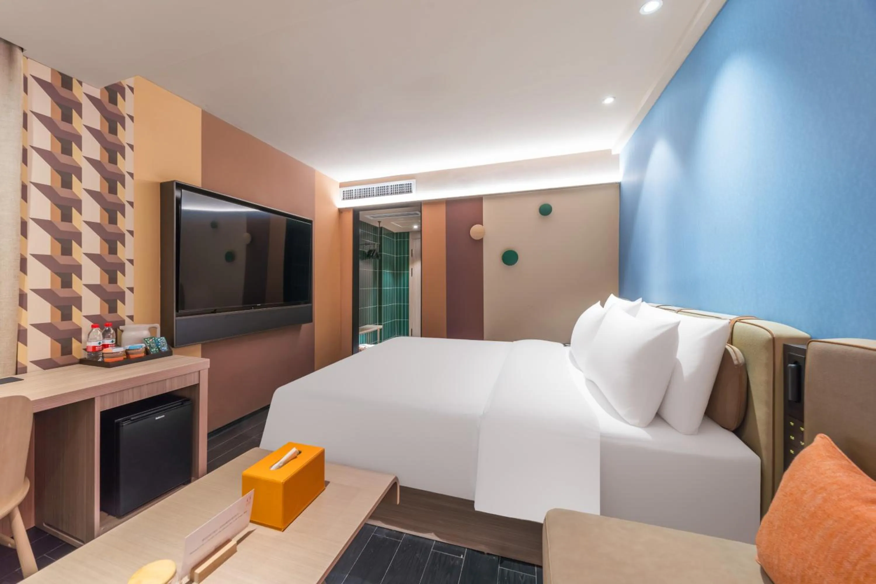 Bed in Orange Hotel Guangzhou Tianhe Gangding Subway Station