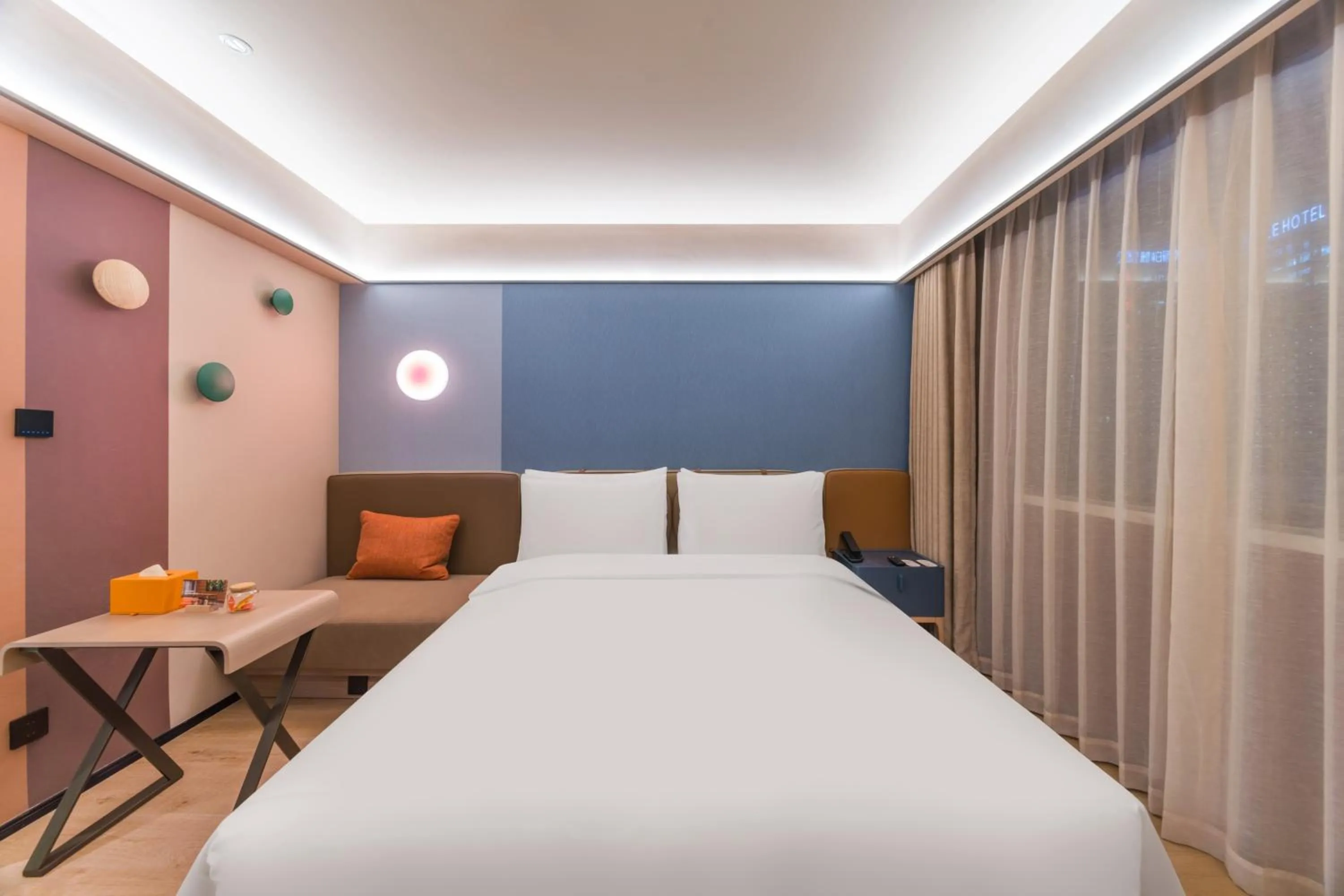 Bed in Orange Hotel Guangzhou Tianhe Gangding Subway Station