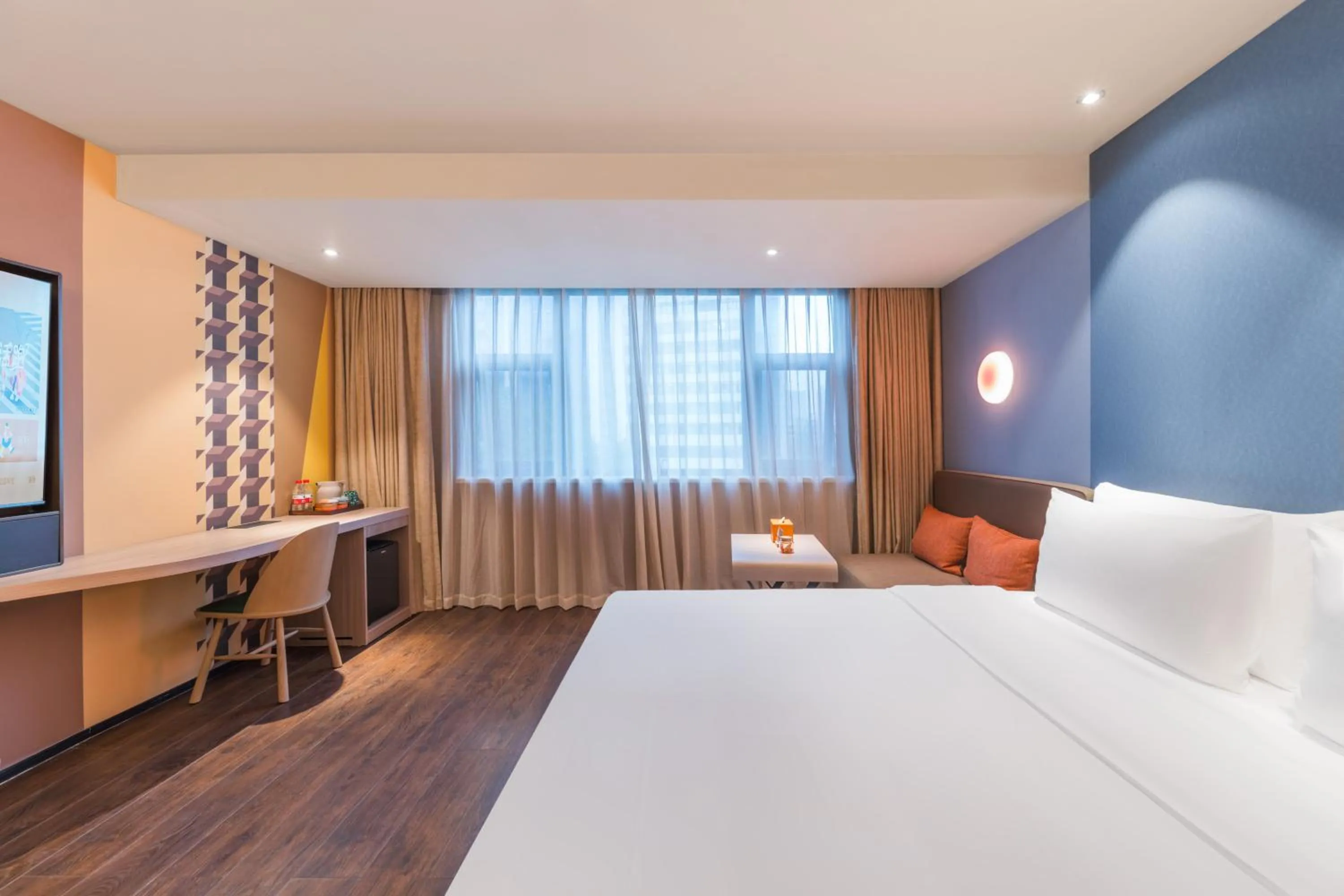 Bed in Orange Hotel Guangzhou Tianhe Gangding Subway Station