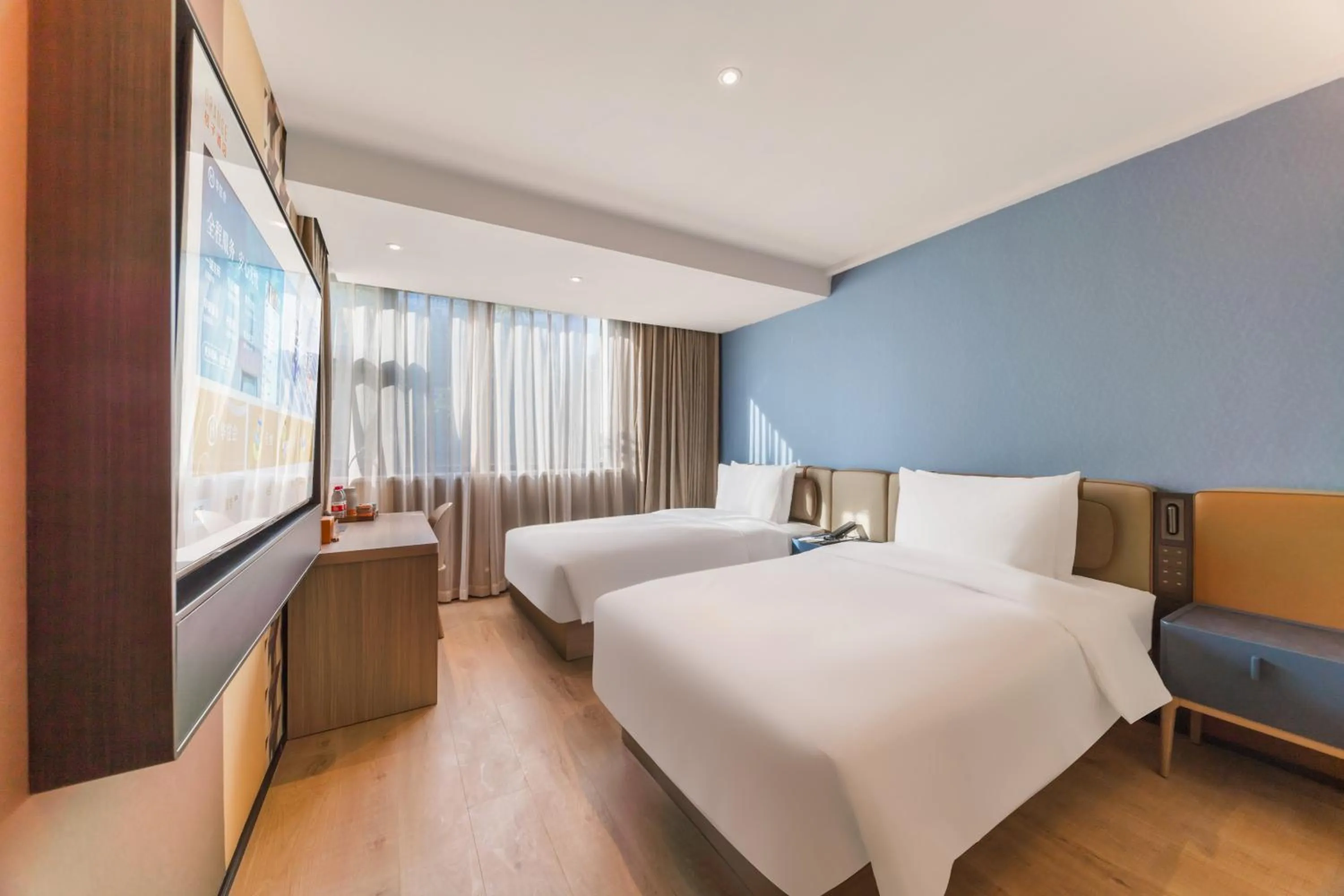 Bed in Orange Hotel Guangzhou Tianhe Gangding Subway Station