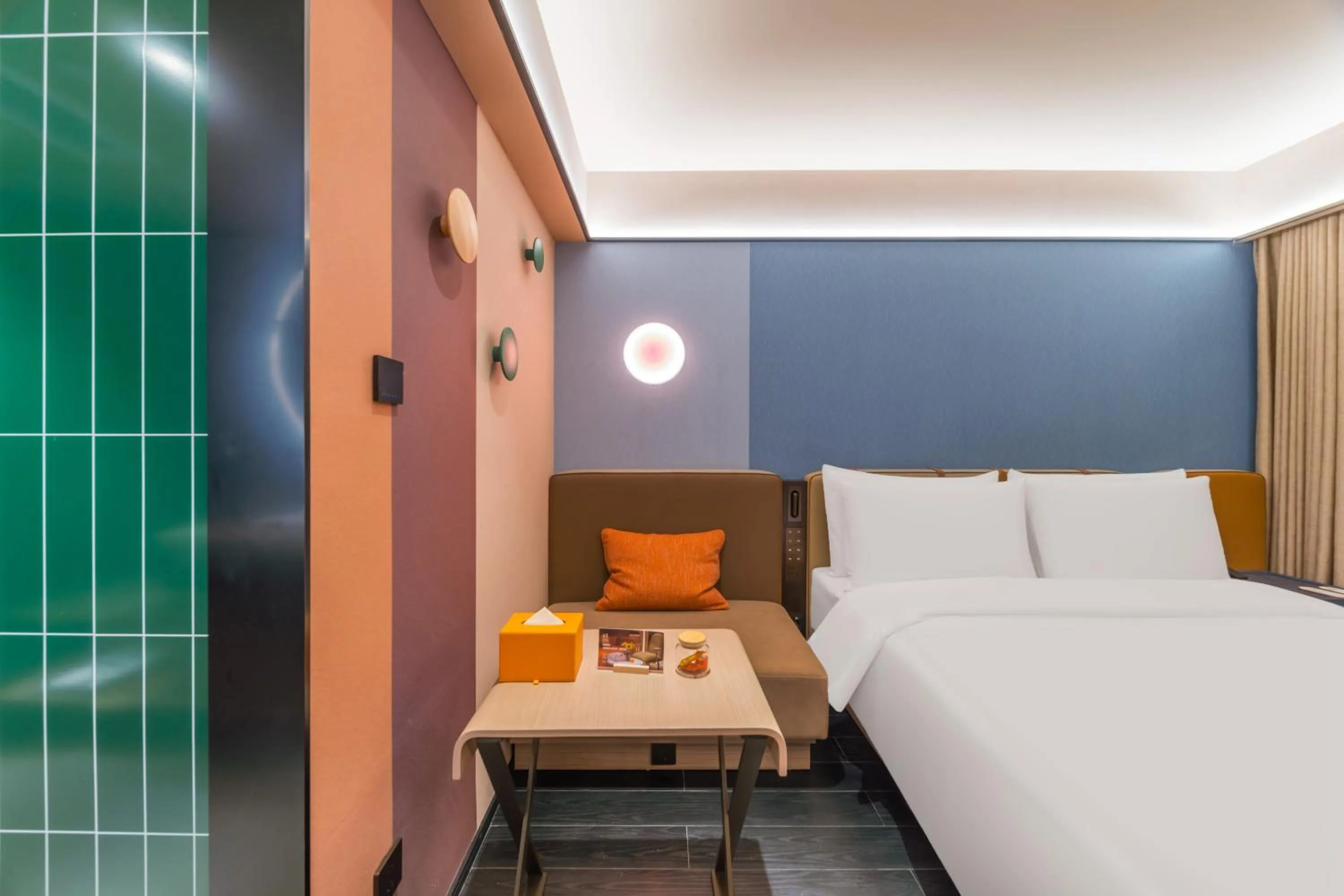 Bed in Orange Hotel Guangzhou Tianhe Gangding Subway Station