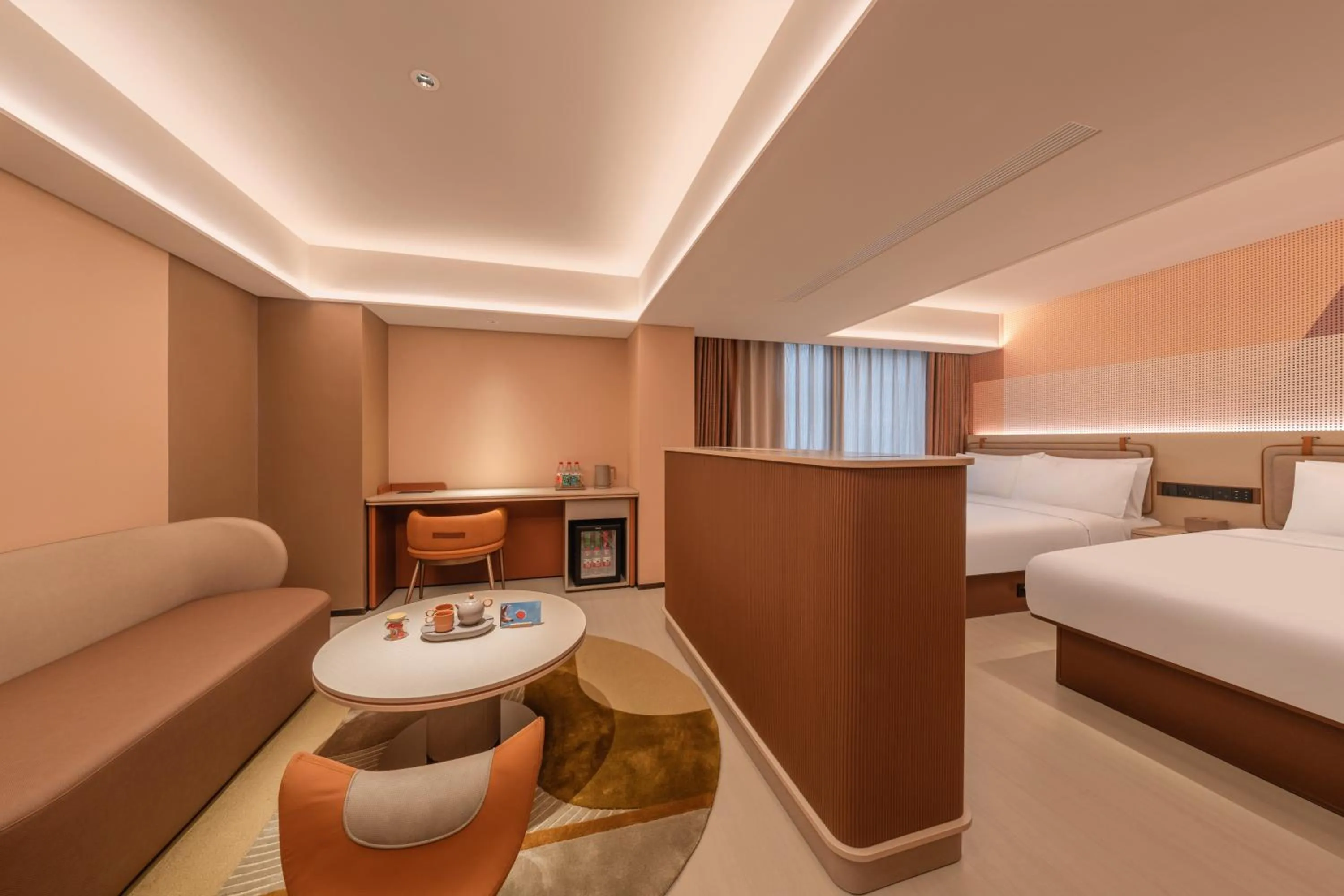 Seating area, Bed in Orange Hotel Chengdu Wenshuyuan Subway Station