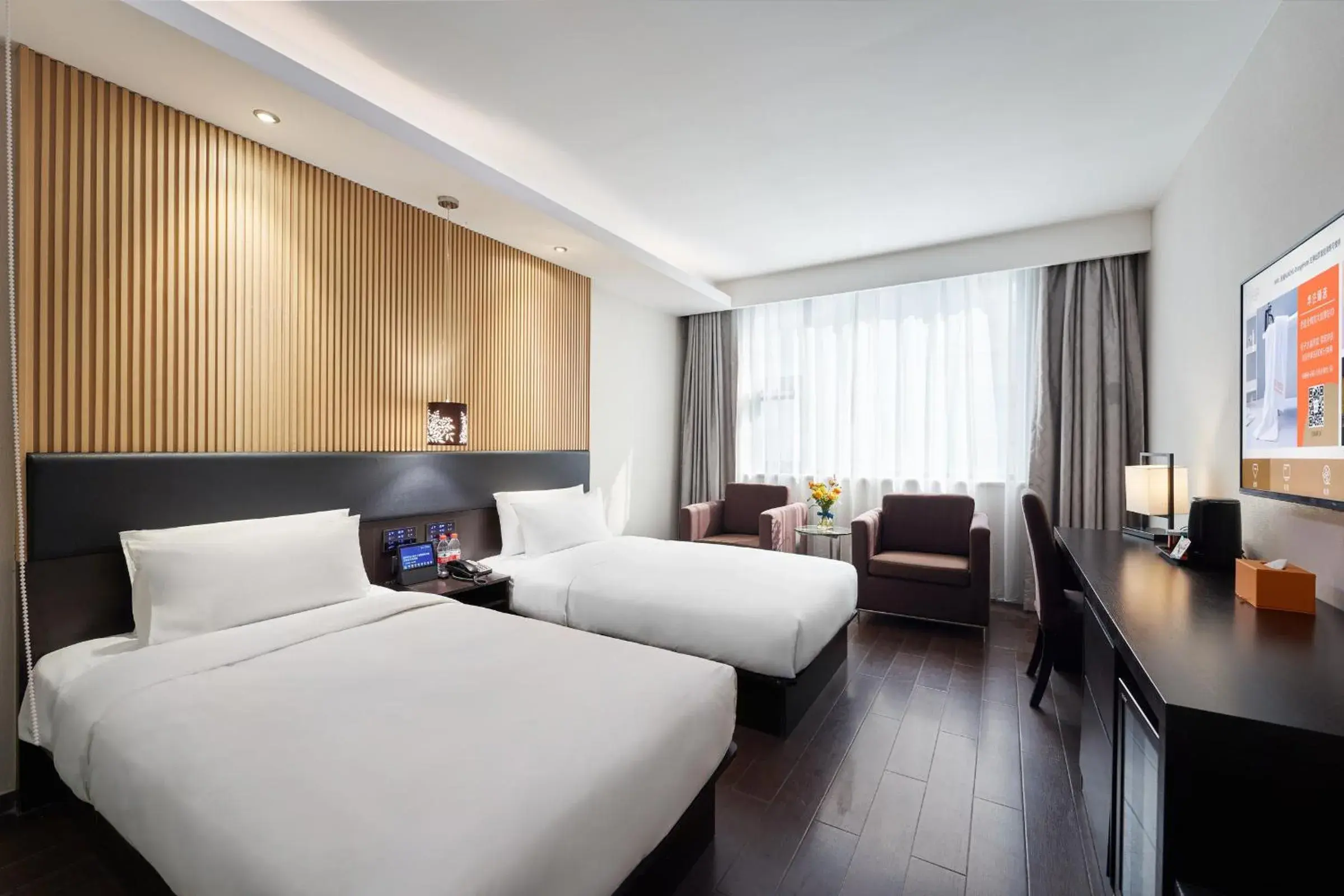 On site, Bed in Orange Hotel Shanghai Xujiahui Caobao Road Subway Station On site, Bed in Orange Hotel Shanghai Xujiahui Caobao Road Subway Station