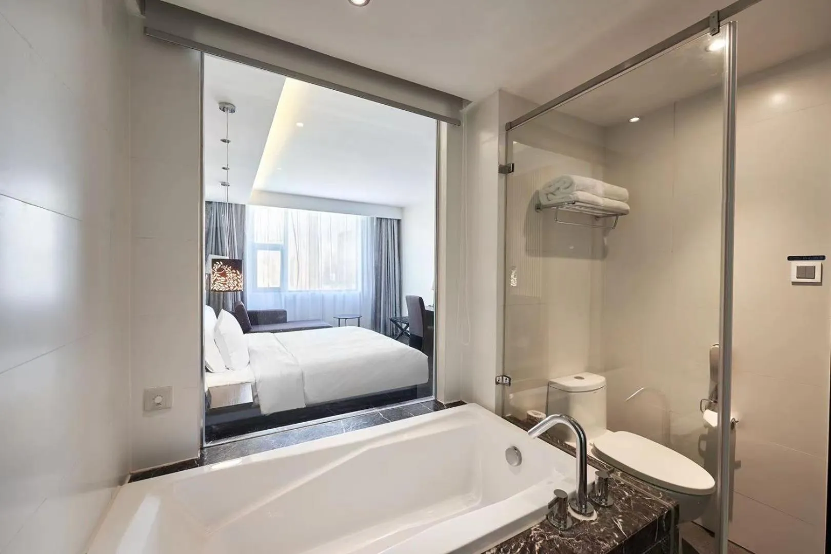 On site, Bed in Orange Hotel Shanghai Xujiahui Caobao Road Subway Station