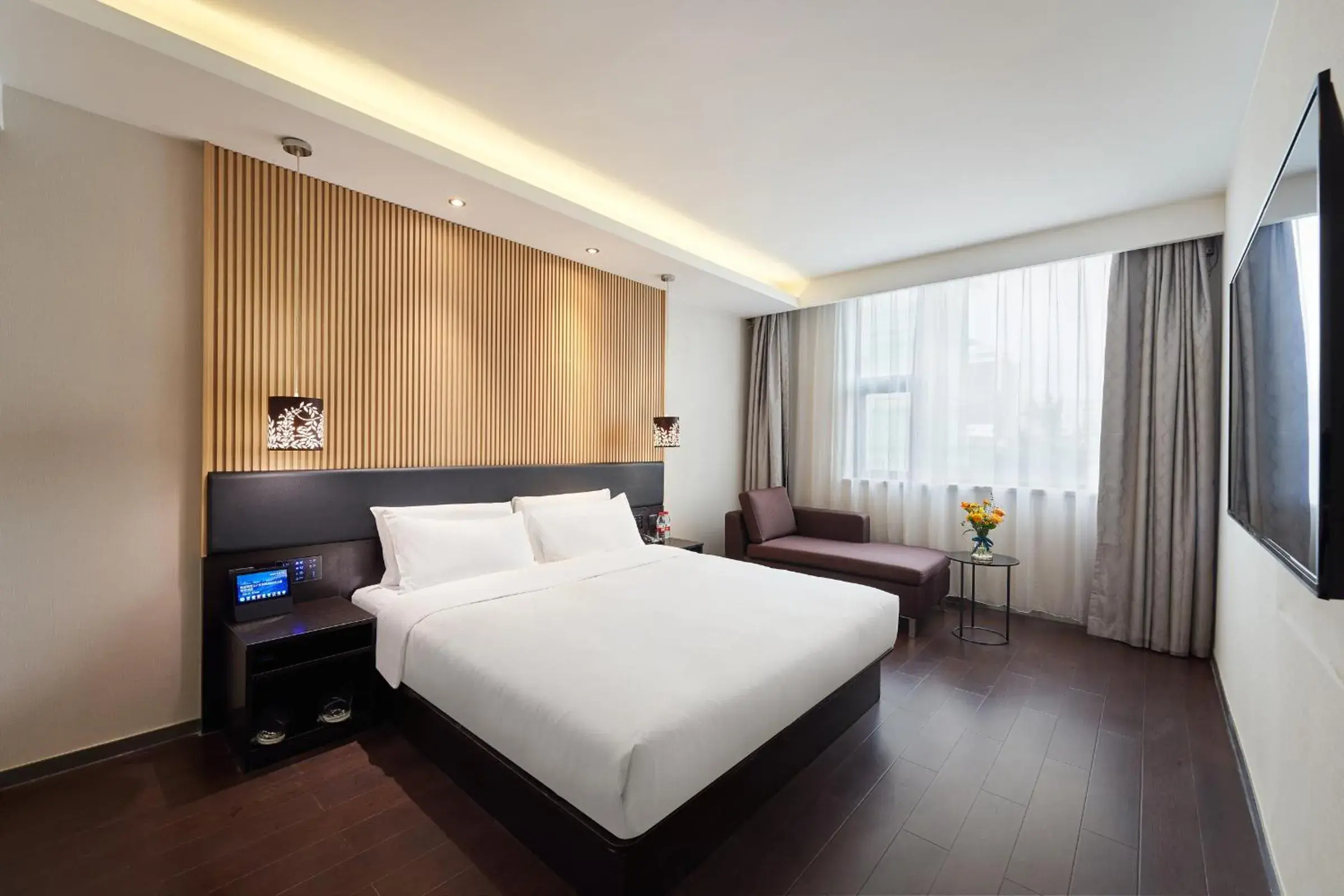 On site, Bed in Orange Hotel Shanghai Xujiahui Caobao Road Subway Station On site, Bed in Orange Hotel Shanghai Xujiahui Caobao Road Subway Station