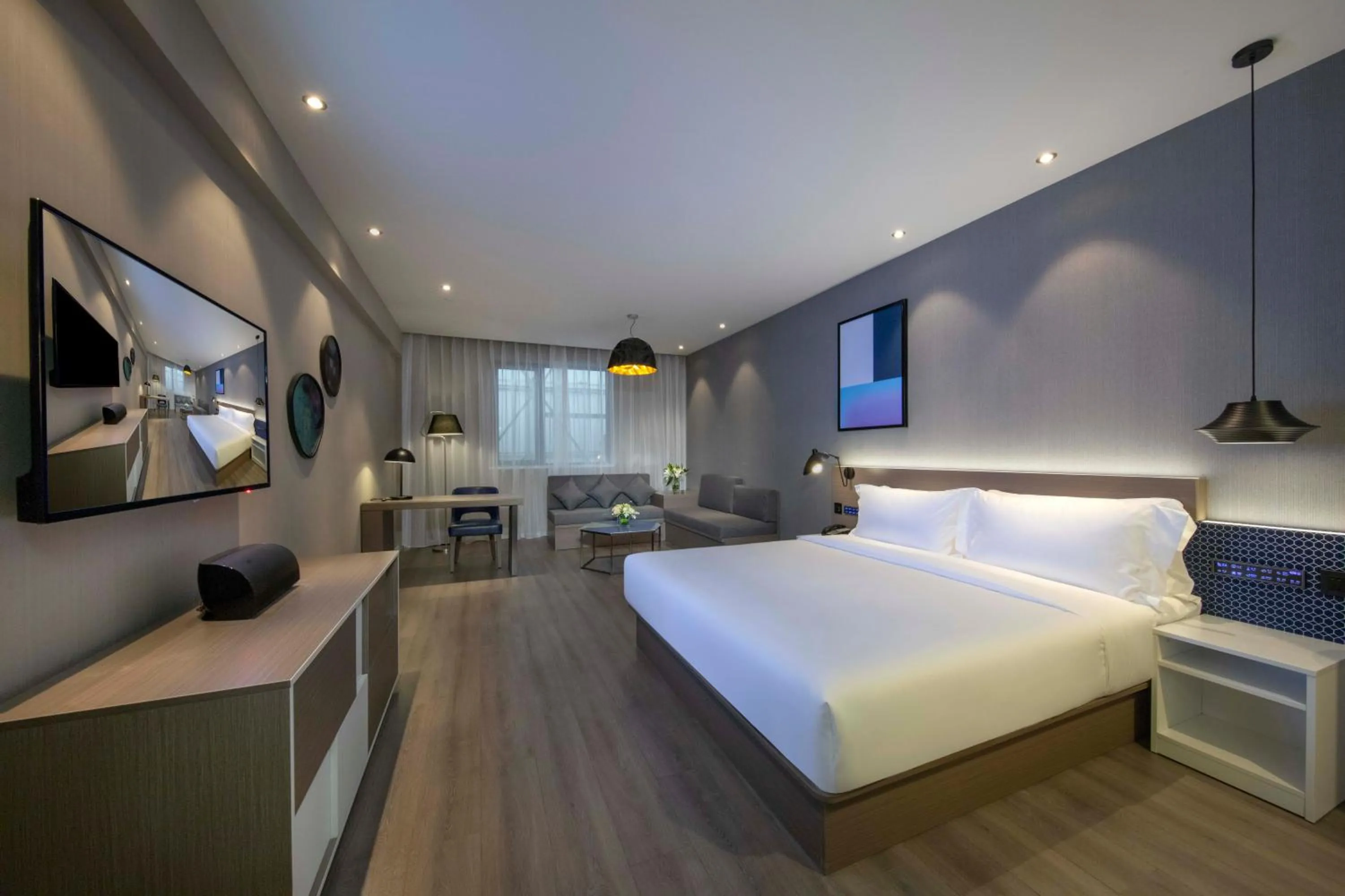 Bed in Orange Hotel Shanghai Hongqiao Railway Station Qixin Road (formerly Hongqiao National Exhibition and Convention Center Qixin Road Branch)