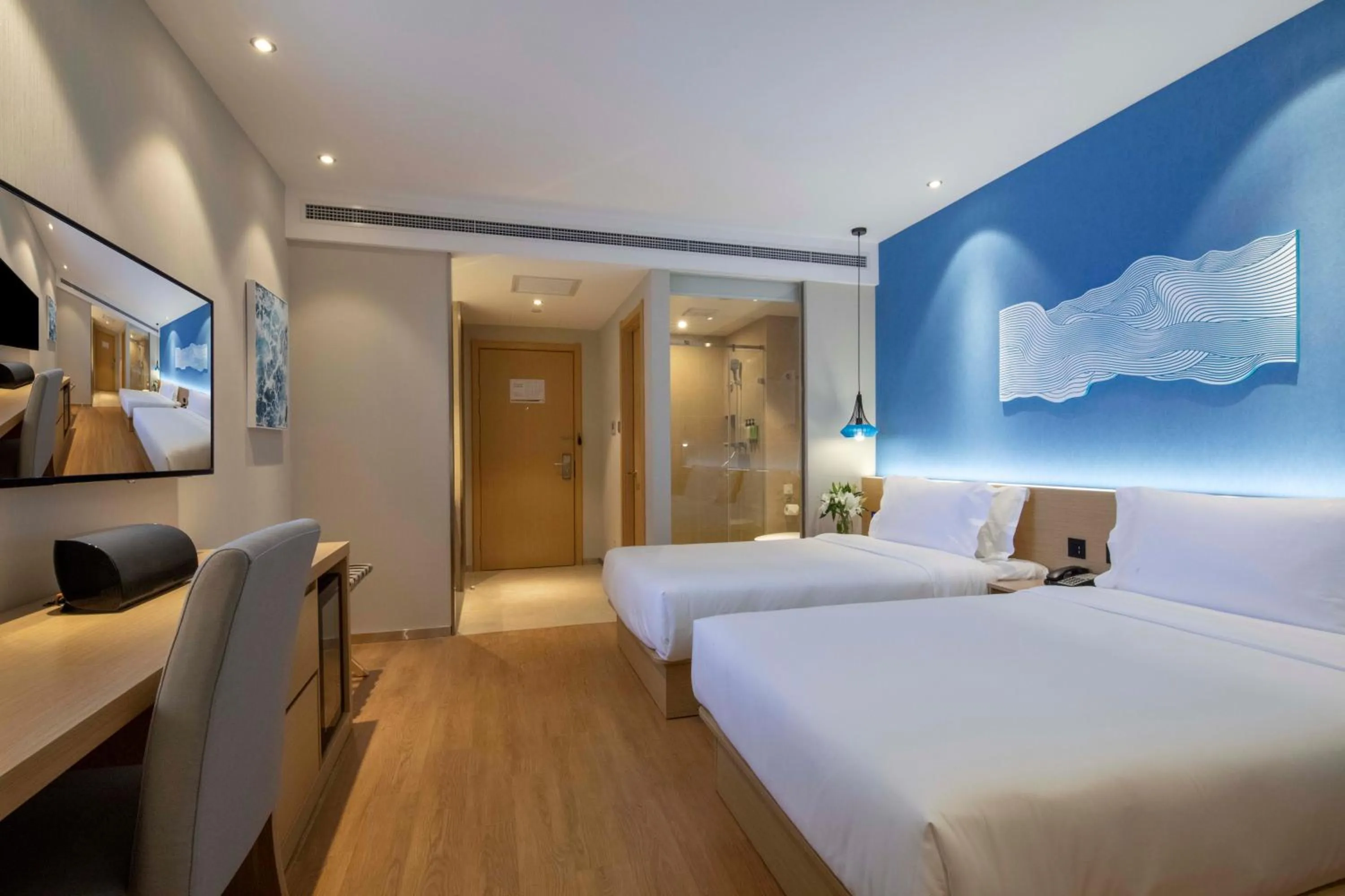 Bed in Orange Hotel Shanghai Hongqiao Railway Station Qixin Road (formerly Hongqiao National Exhibition and Convention Center Qixin Road Branch)