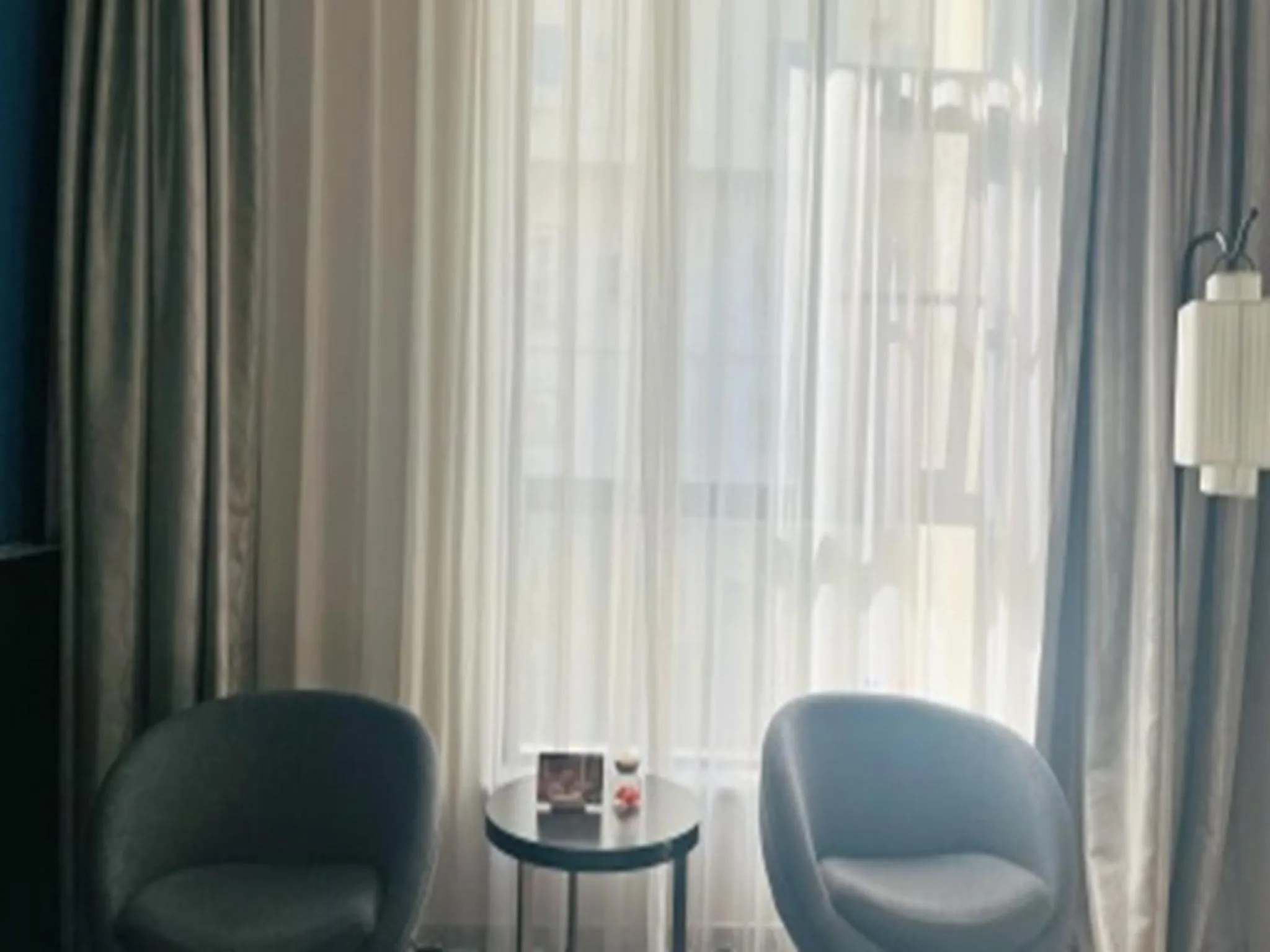 Seating area in Orange Hotel Suzhou North Station Cailian Square