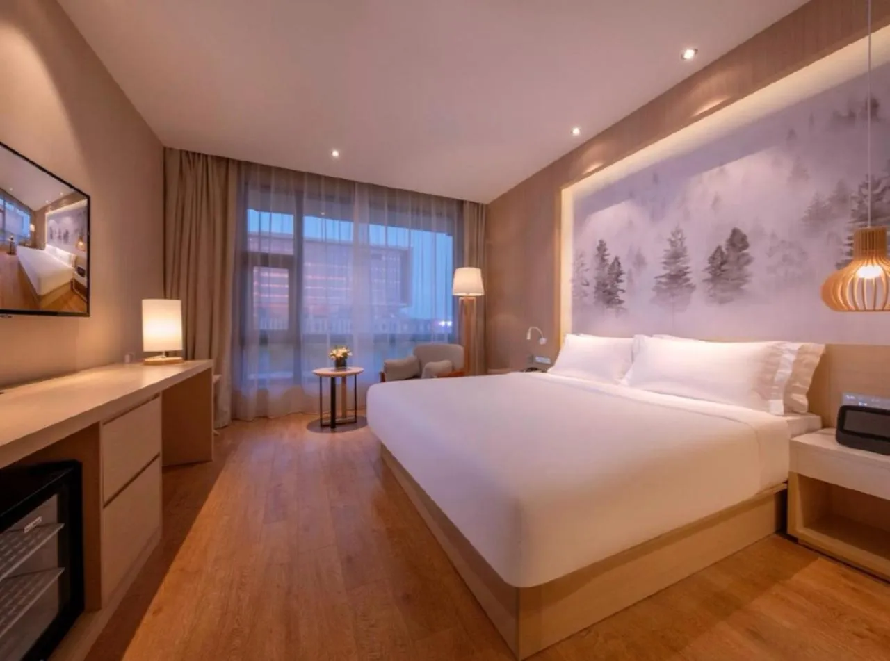 Photo of the whole room, Bed in Orange Hotel Suzhou Dushu Lake Higher Education Zone