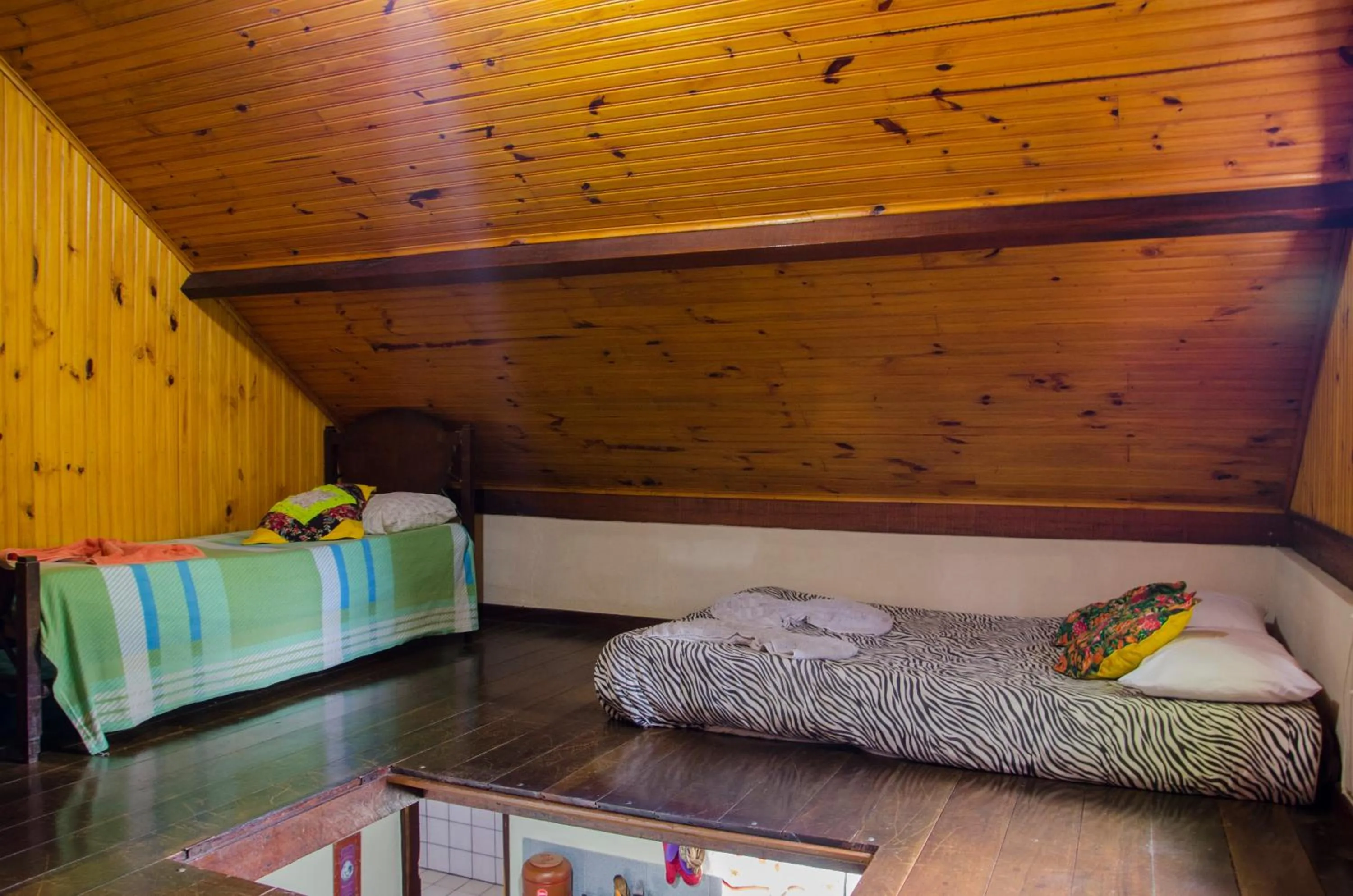 Bed in Chalés Lirio dos Vales