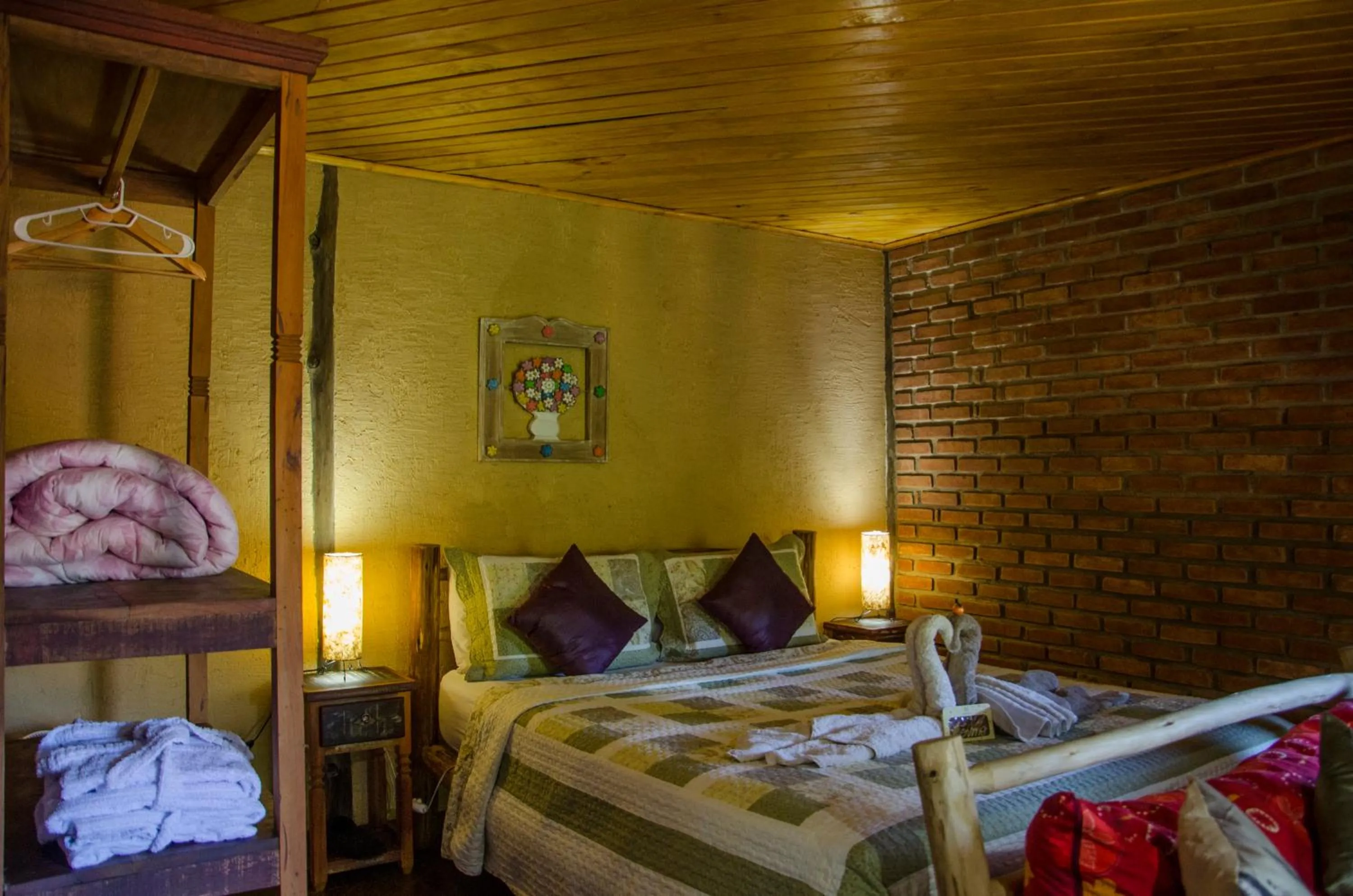 Bed in Chalés Lirio dos Vales