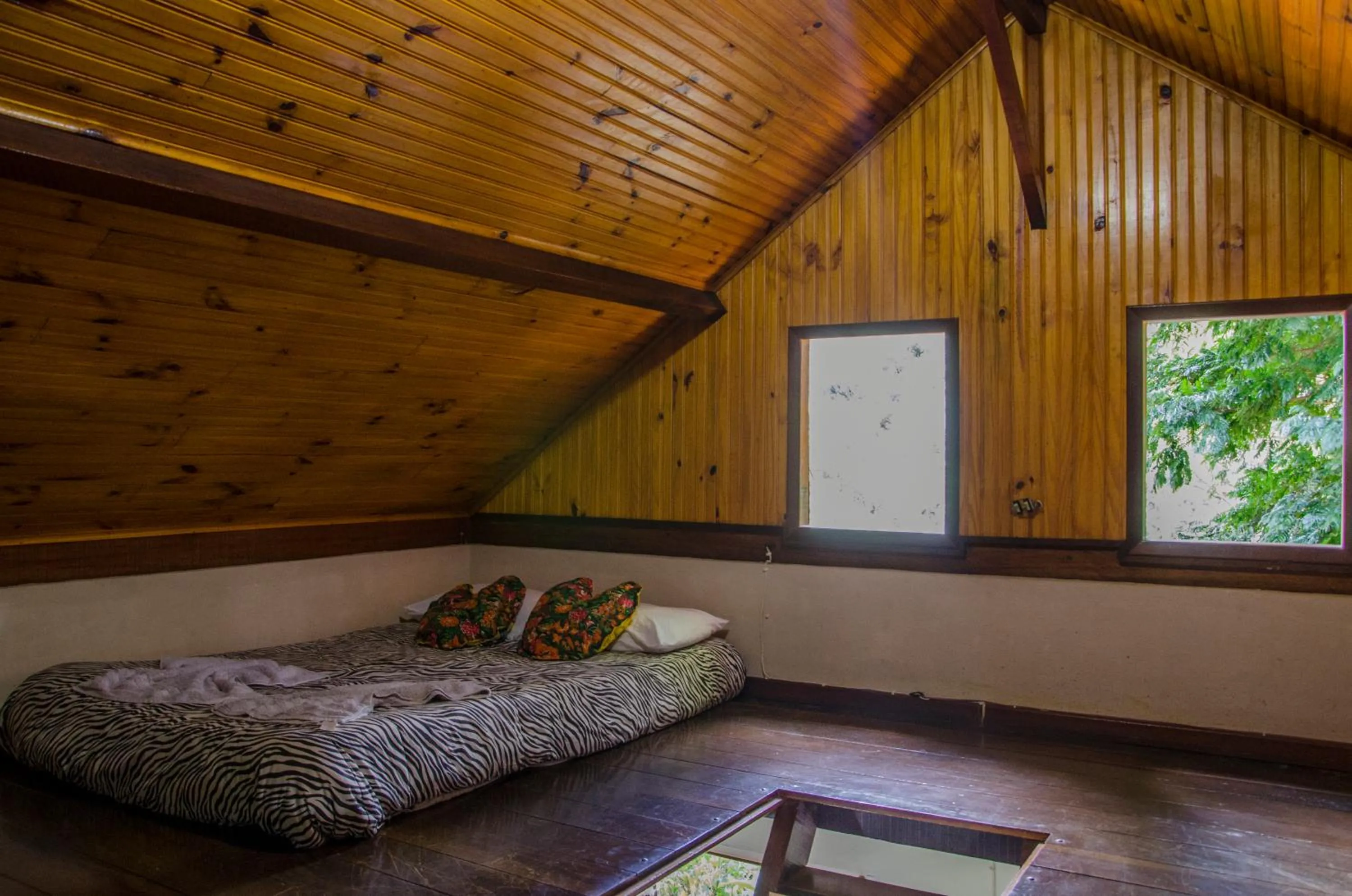 Bed in Chalés Lirio dos Vales