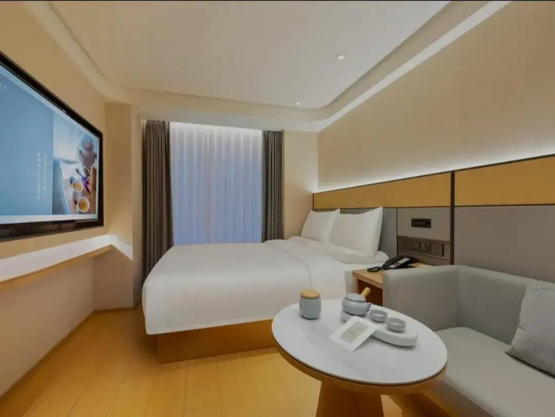 Bed in JI Hotel Beijing South Railway Station Jiaomen West Subway Station Bed in JI Hotel Beijing South Railway Station Jiaomen West Subway Station