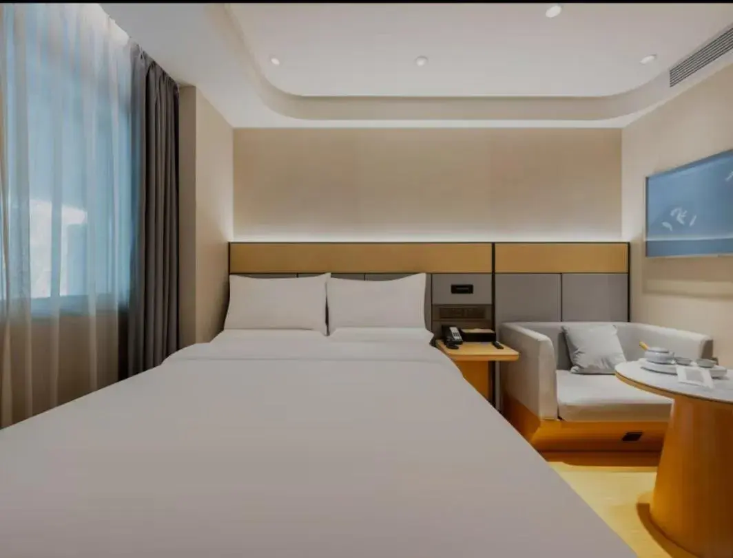 Bed in JI Hotel Beijing South Railway Station Jiaomen West Subway Station Bed in JI Hotel Beijing South Railway Station Jiaomen West Subway Station