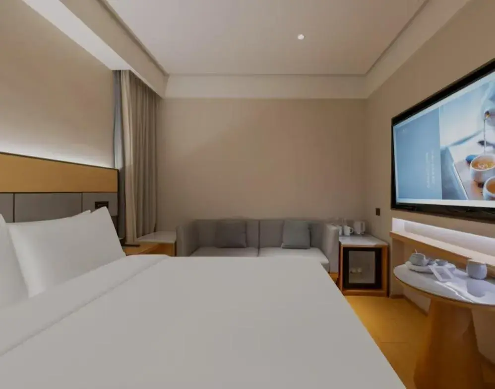 Bed in JI Hotel Beijing South Railway Station Jiaomen West Subway Station Bed in JI Hotel Beijing South Railway Station Jiaomen West Subway Station