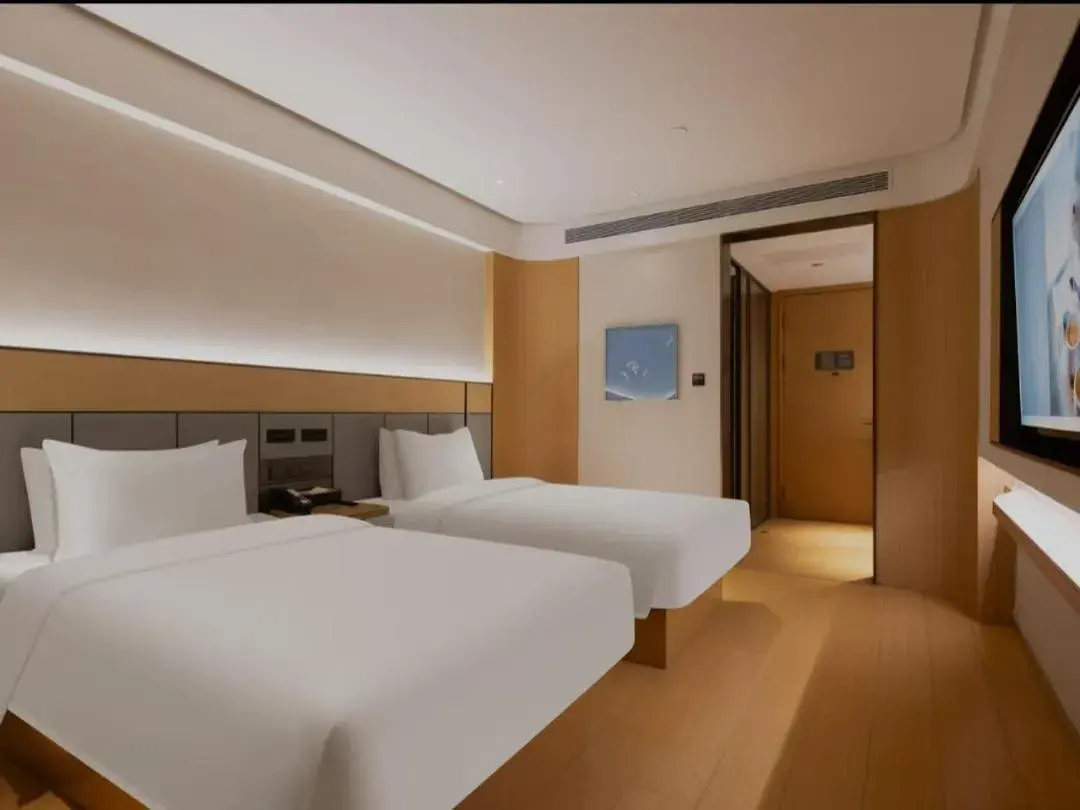 Bed in JI Hotel Beijing South Railway Station Jiaomen West Subway Station Bed in JI Hotel Beijing South Railway Station Jiaomen West Subway Station