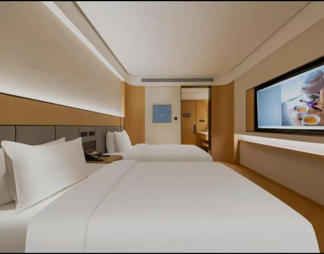 Bed in JI Hotel Beijing South Railway Station Jiaomen West Subway Station