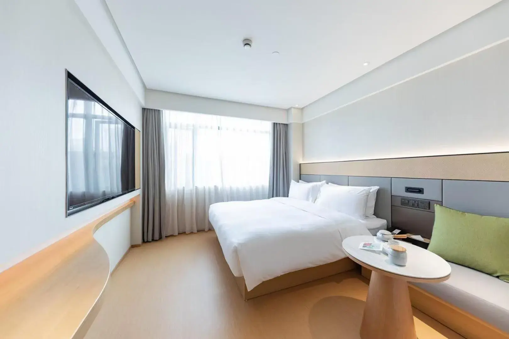 Bed in JI Hotel Shanghai Xintiandi South Xizang Road Bed in JI Hotel Shanghai Xintiandi South Xizang Road