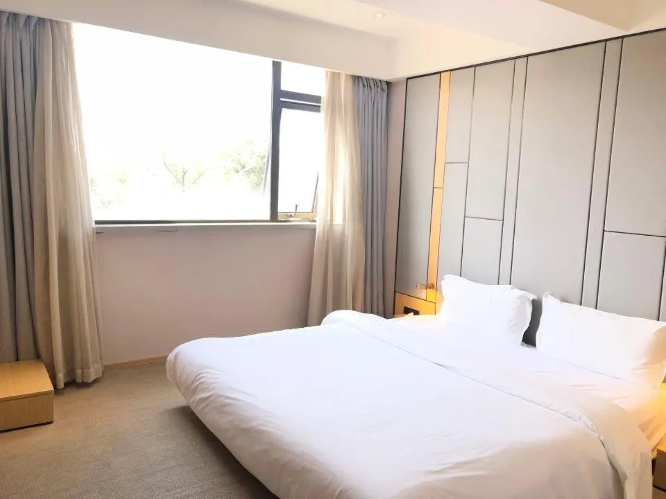 Bed in JI Hotel Shanghai Caohejing Lianhua Road