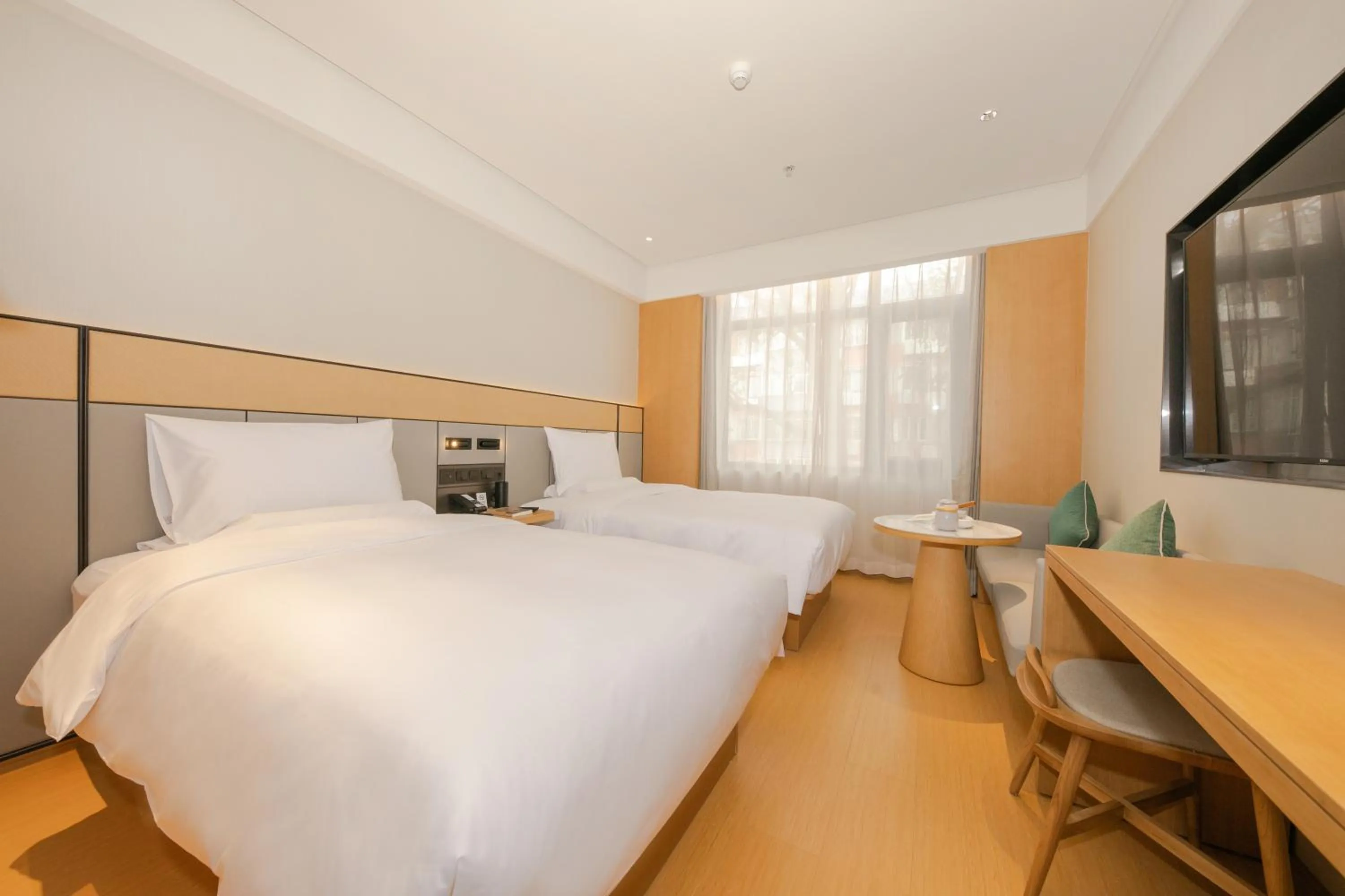 Bed in JI Hotel Beijing Guanganmen