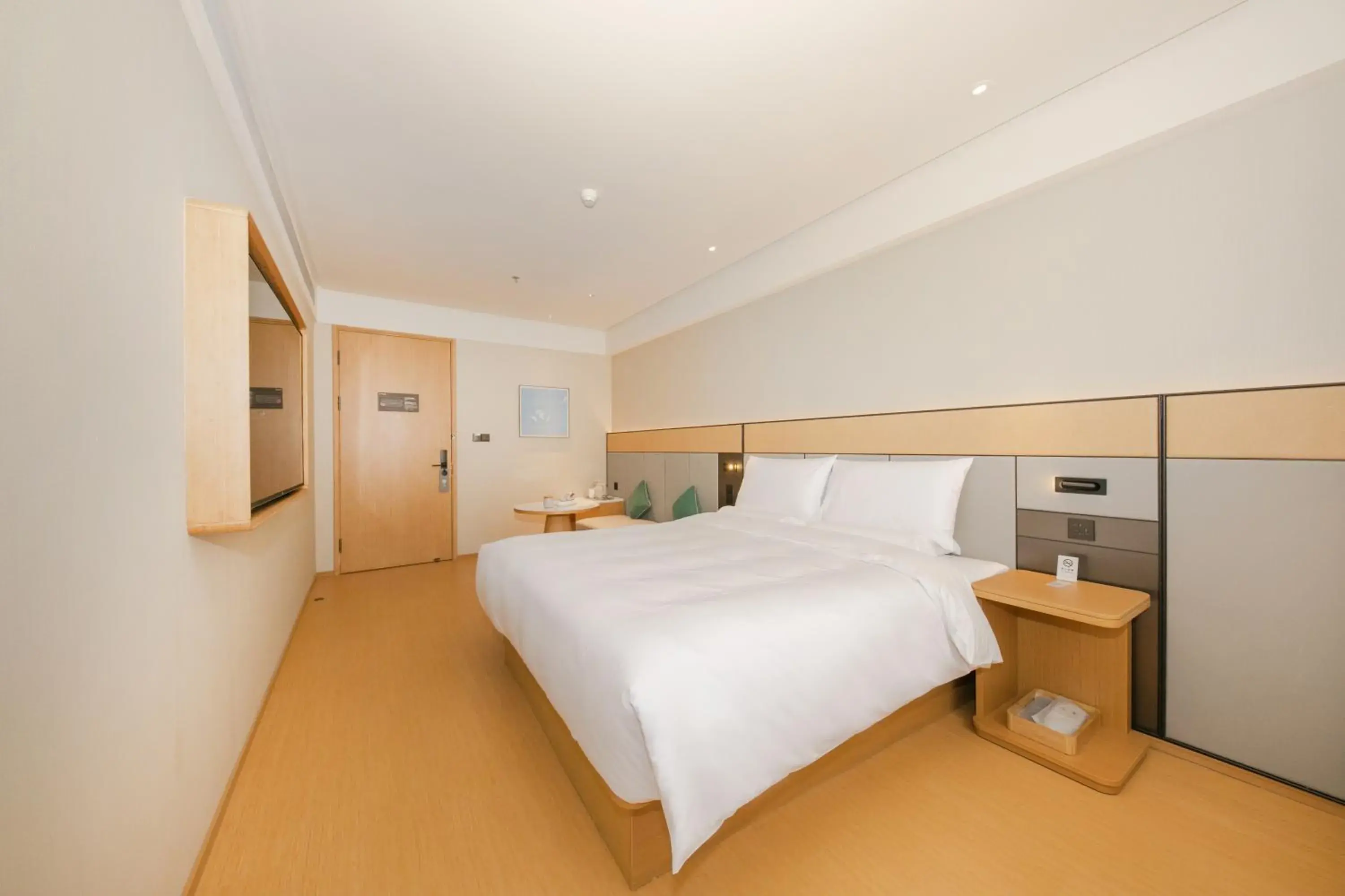 Bed in JI Hotel Beijing Guanganmen Bed in JI Hotel Beijing Guanganmen