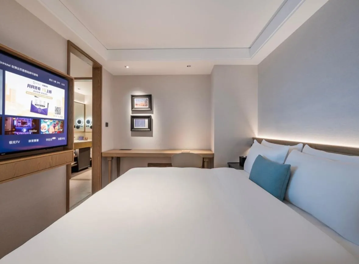 Bed in Manxin Hotel Wuhan Jianghan Road Pedestrian Street