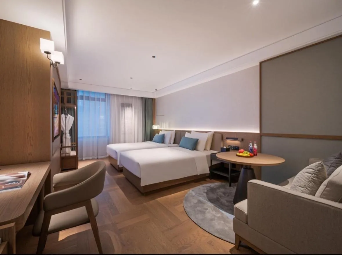 Bed in Manxin Hotel Wuhan Jianghan Road Pedestrian Street