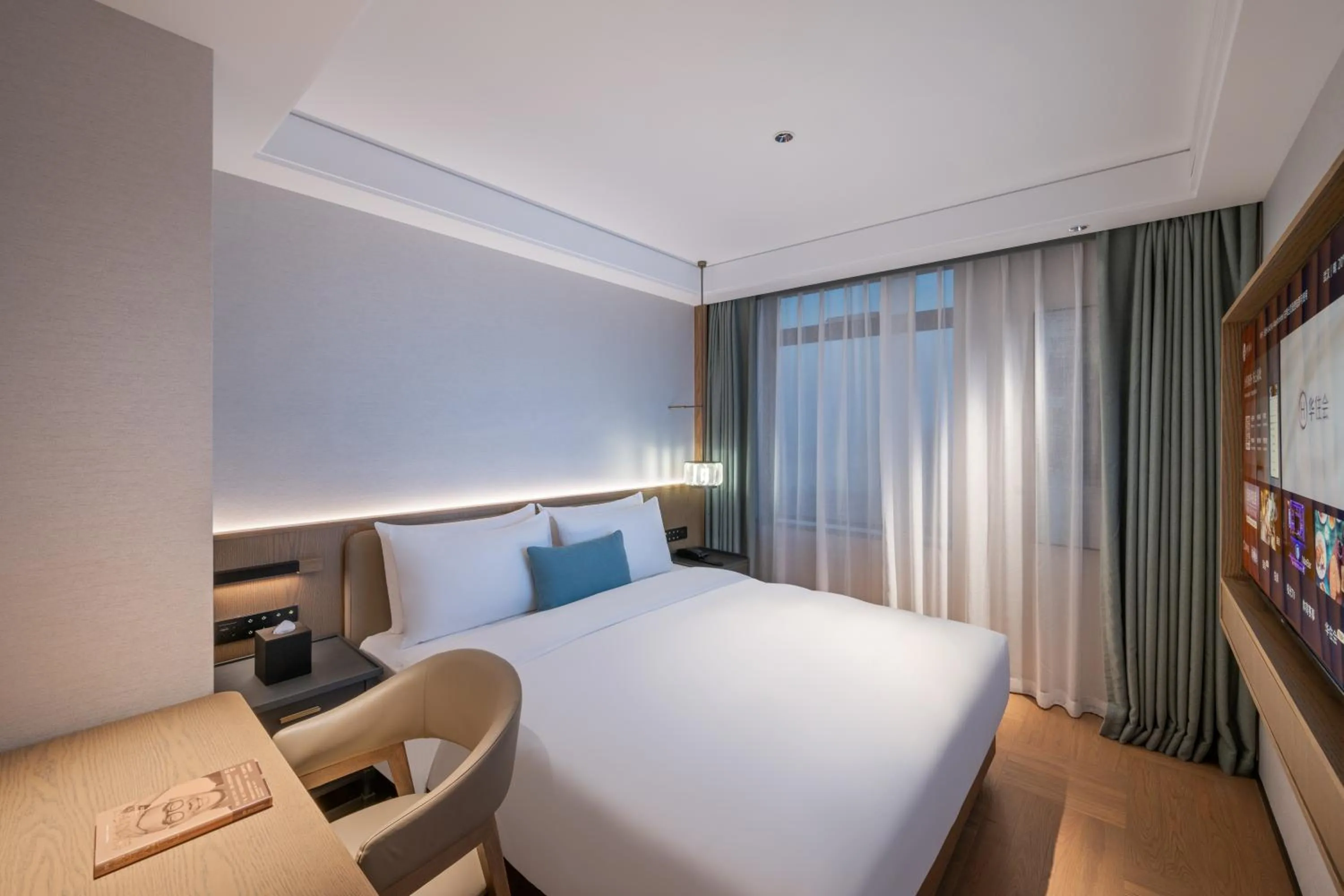 Bed in Manxin Hotel Wuhan Jianghan Road Pedestrian Street