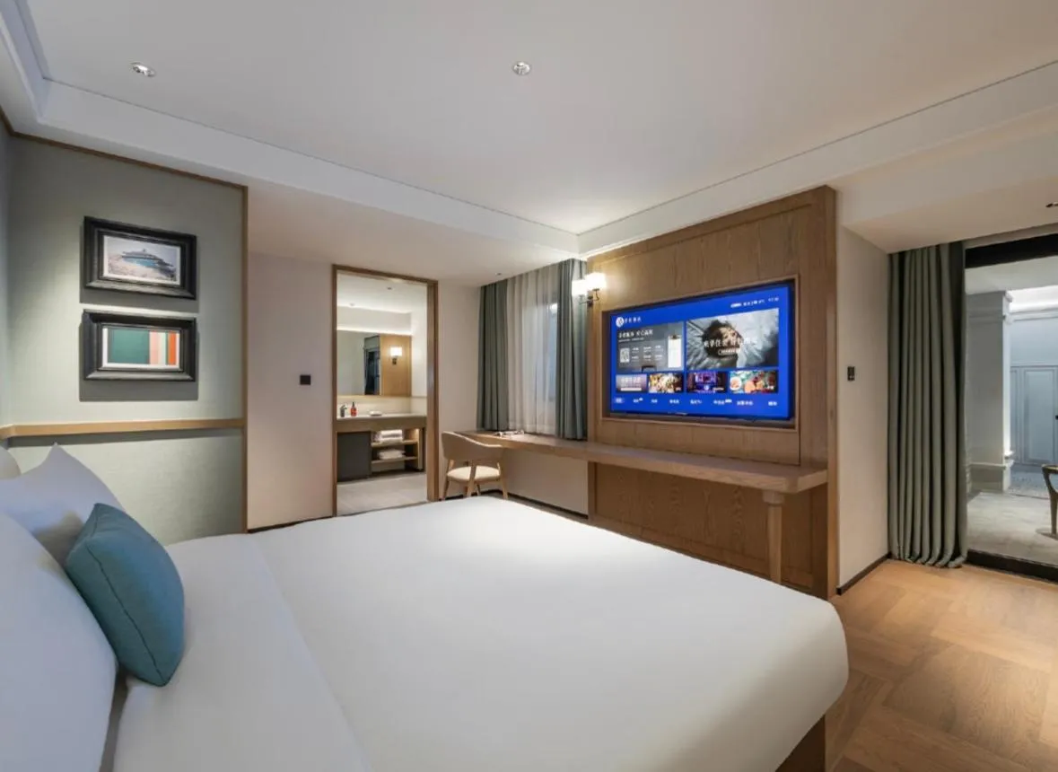 Bed in Manxin Hotel Wuhan Jianghan Road Pedestrian Street