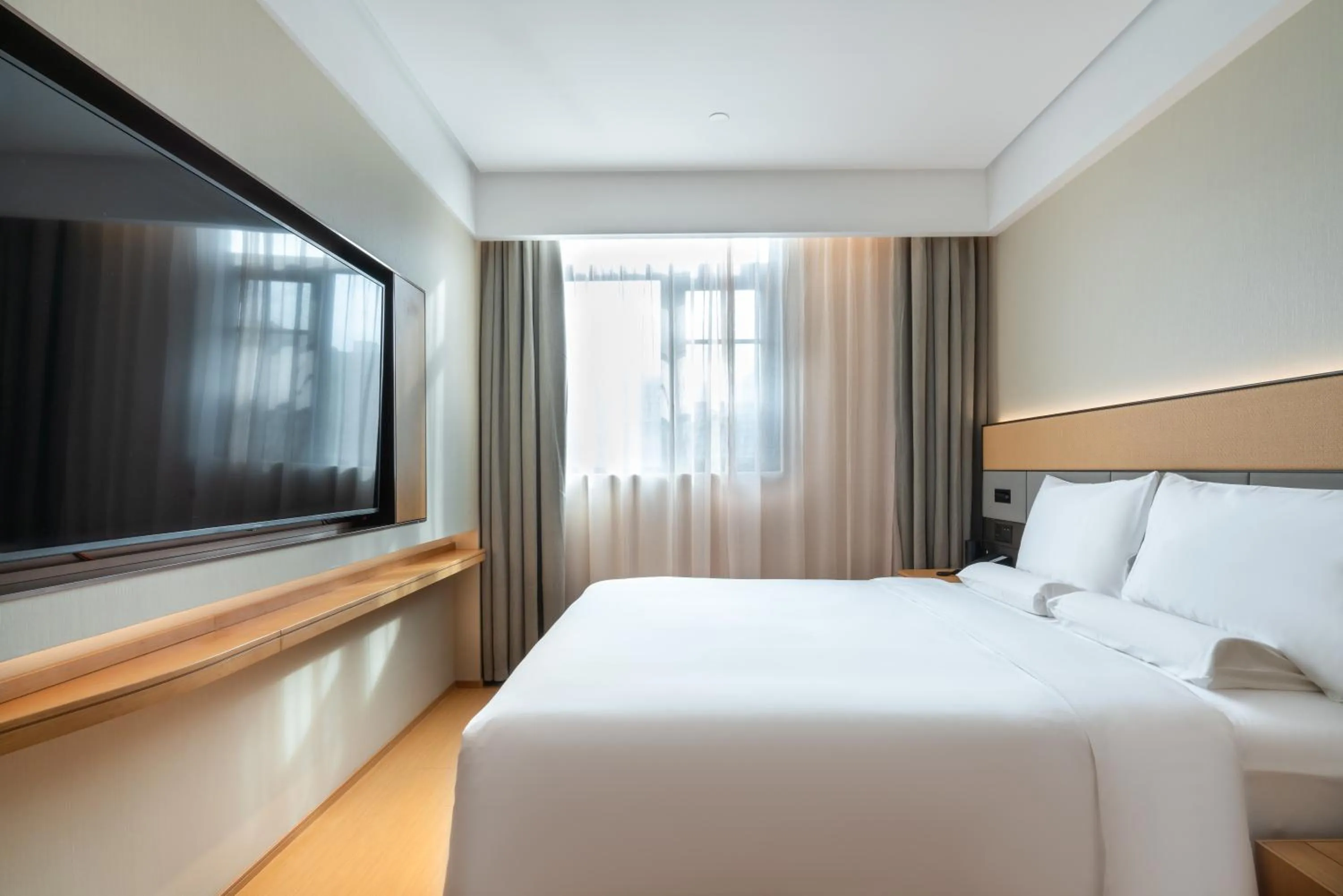 Bed in JI Hotel Guangzhou Tower