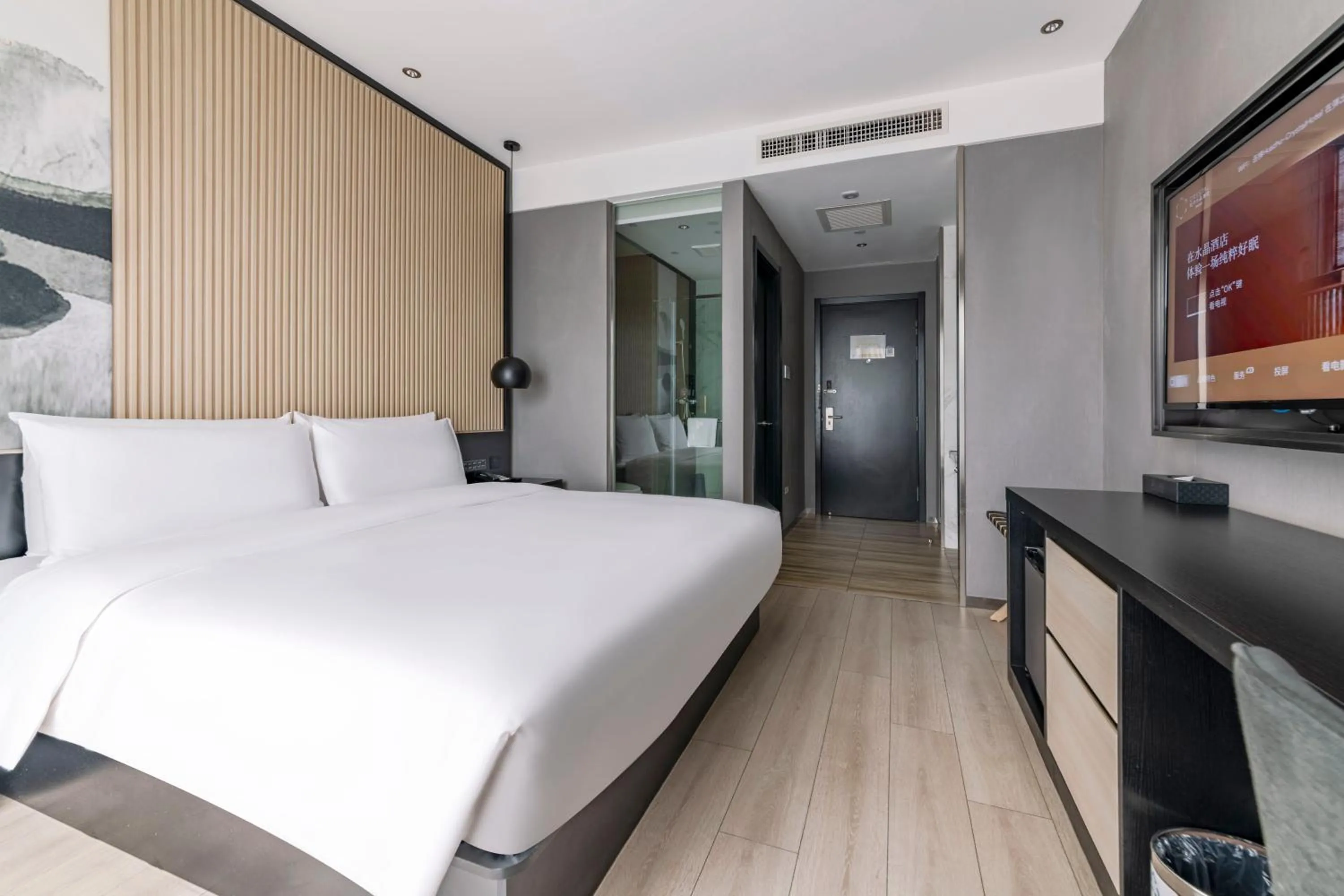 Bed in Orange Crystal Hotel Shenzhen Baoan Airport Bihaiwan