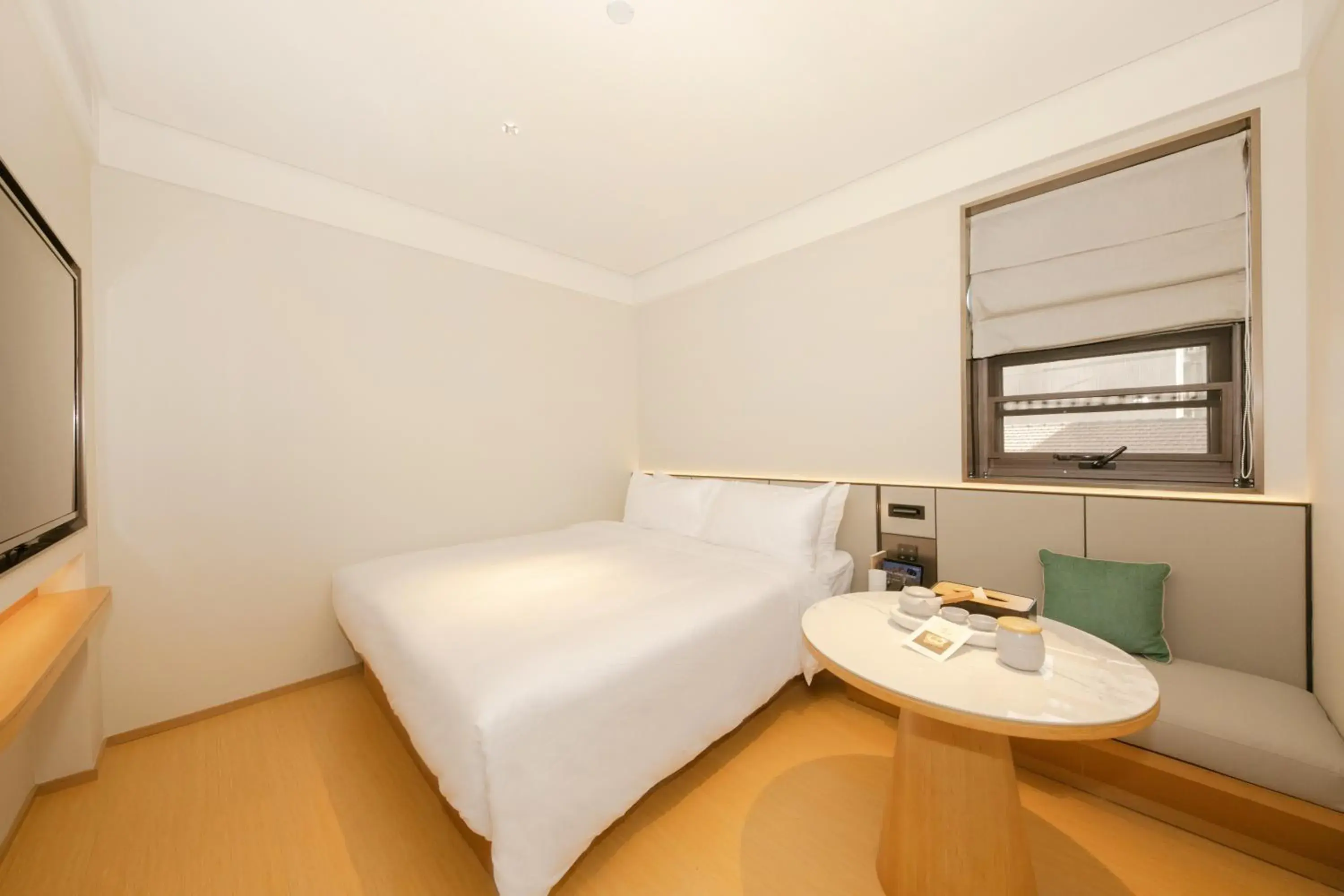 Bed in JI Hotel Beijing International Exhibition Center Sanyuan West Bridge Bed in JI Hotel Beijing International Exhibition Center Sanyuan West Bridge