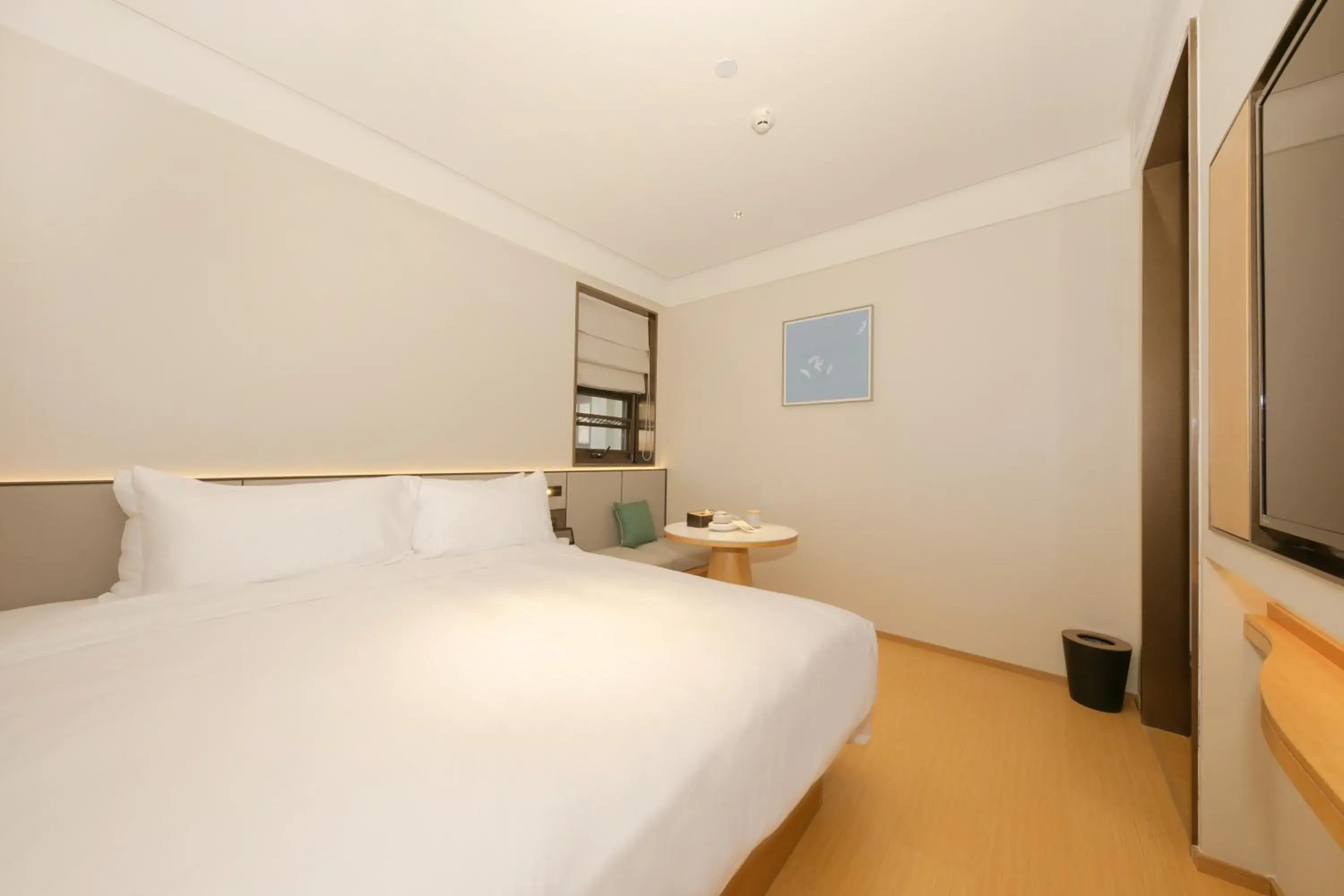 Bed in JI Hotel Beijing International Exhibition Center Sanyuan West Bridge Bed in JI Hotel Beijing International Exhibition Center Sanyuan West Bridge