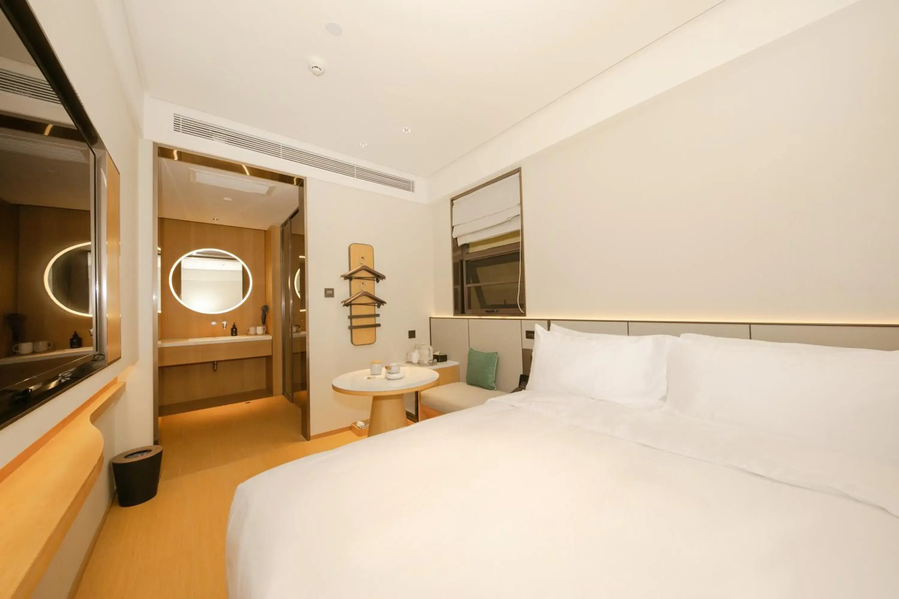 Bed in JI Hotel Beijing International Exhibition Center Sanyuan West Bridge Bed in JI Hotel Beijing International Exhibition Center Sanyuan West Bridge