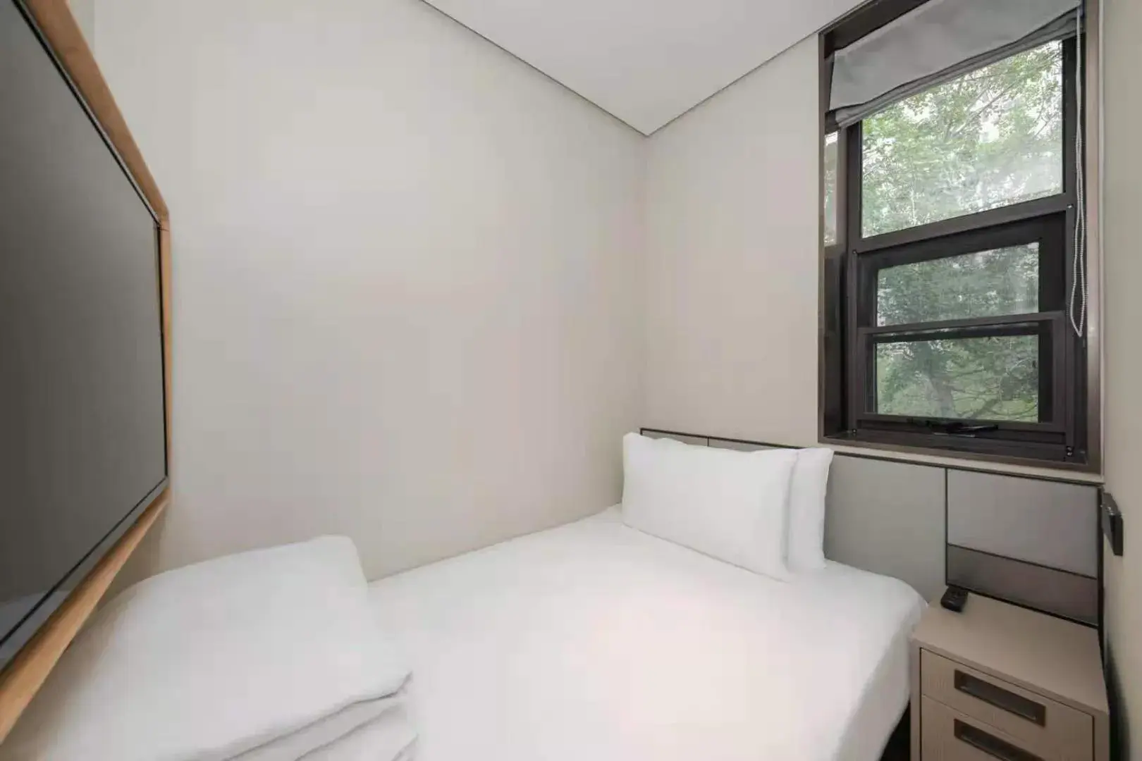 Bed in JI Hotel Beijing International Exhibition Center Sanyuan West Bridge Bed in JI Hotel Beijing International Exhibition Center Sanyuan West Bridge