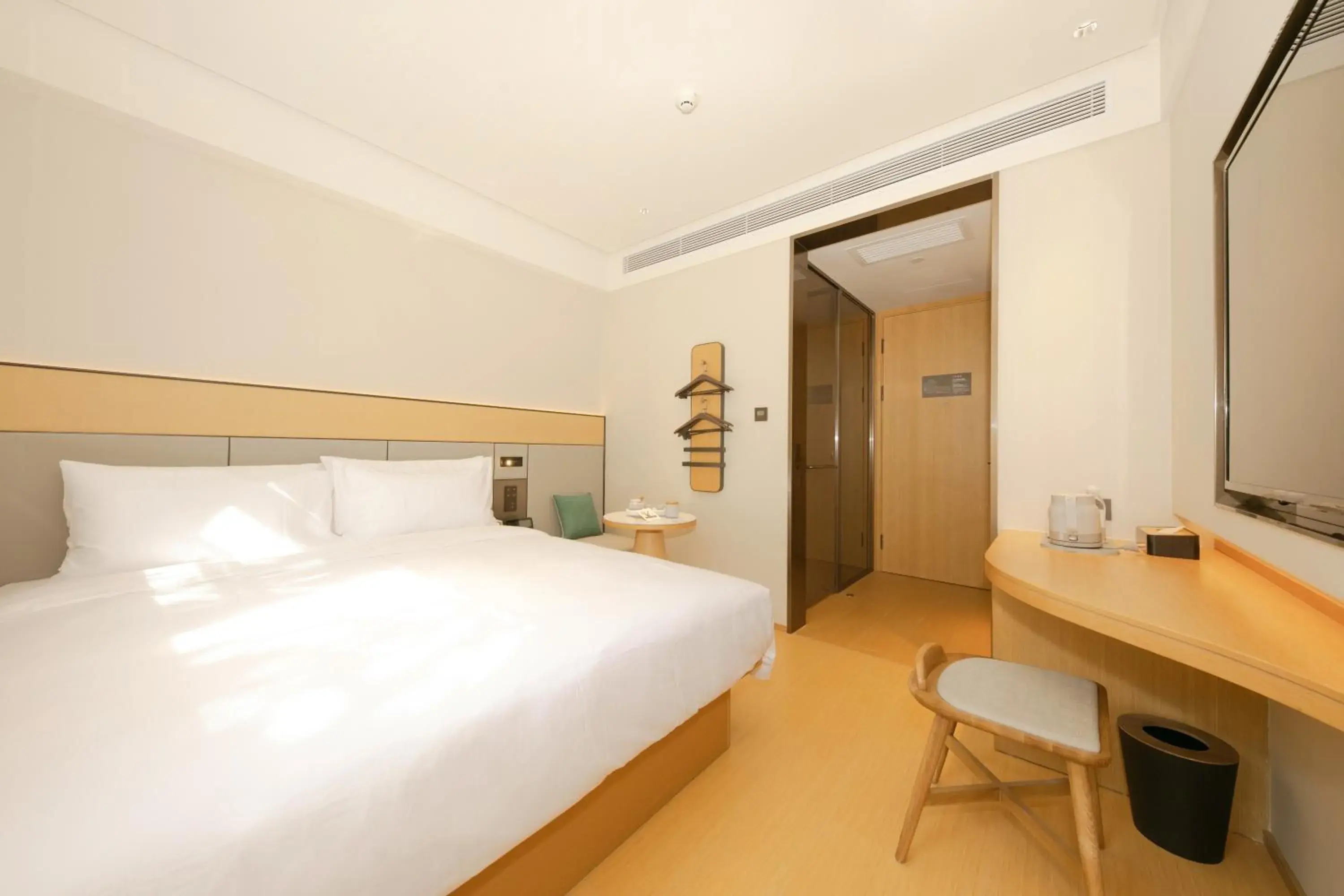 Bed in JI Hotel Beijing International Exhibition Center Sanyuan West Bridge Bed in JI Hotel Beijing International Exhibition Center Sanyuan West Bridge