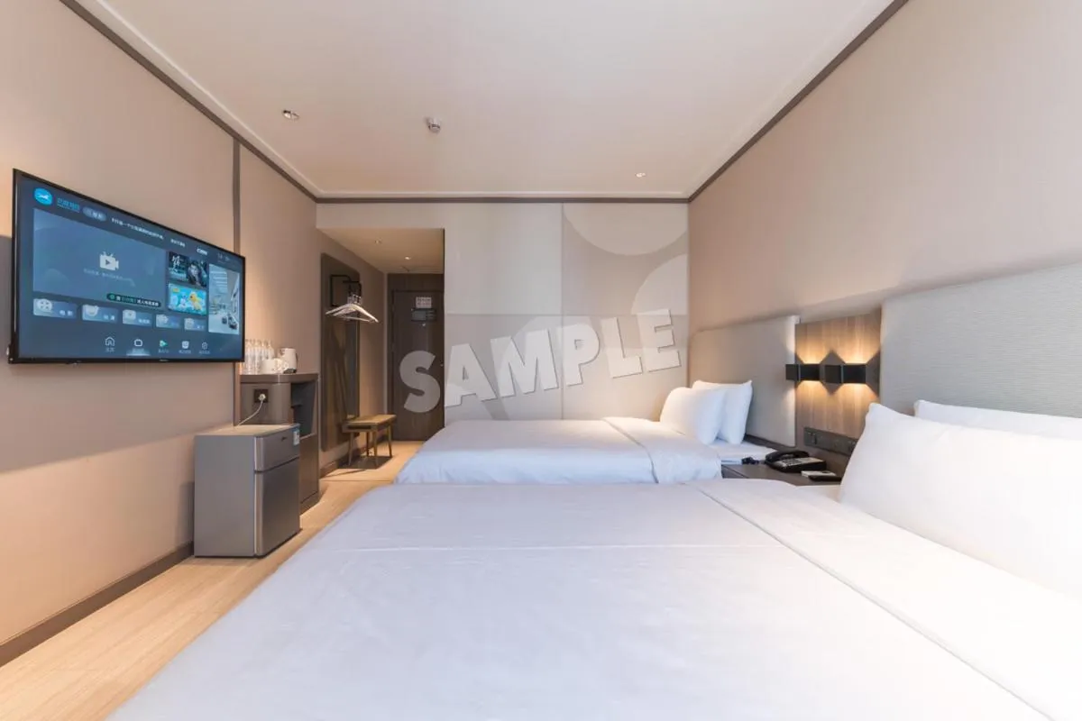 Bed in Hanting Hotel Shenzhen Vanke Yuncheng Xili Subway Station
