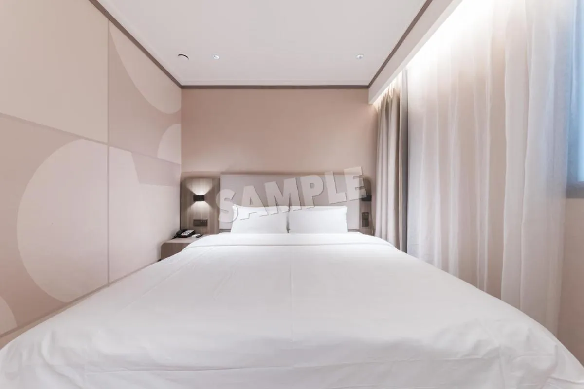 Bed in Hanting Hotel Shenzhen Vanke Yuncheng Xili Subway Station