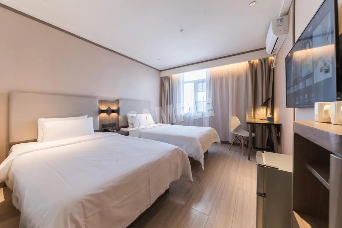 Bed in Hanting Hotel Shenzhen Vanke Yuncheng Xili Subway Station