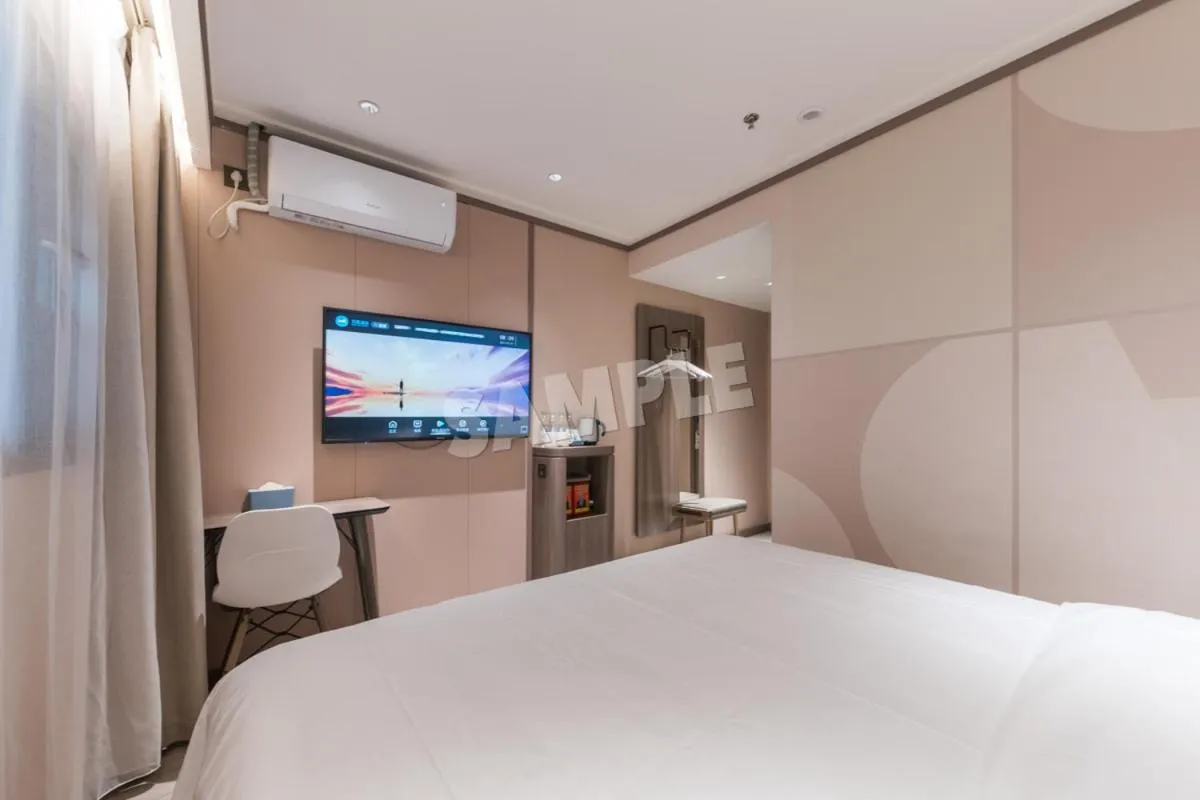 Bed in Hanting Hotel Shenzhen Vanke Yuncheng Xili Subway Station