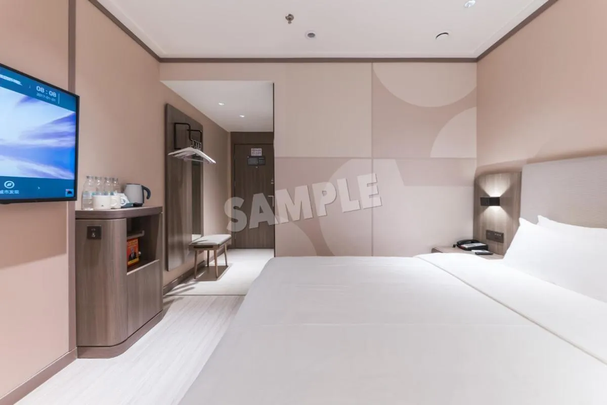 Bed in Hanting Hotel Shenzhen Vanke Yuncheng Xili Subway Station