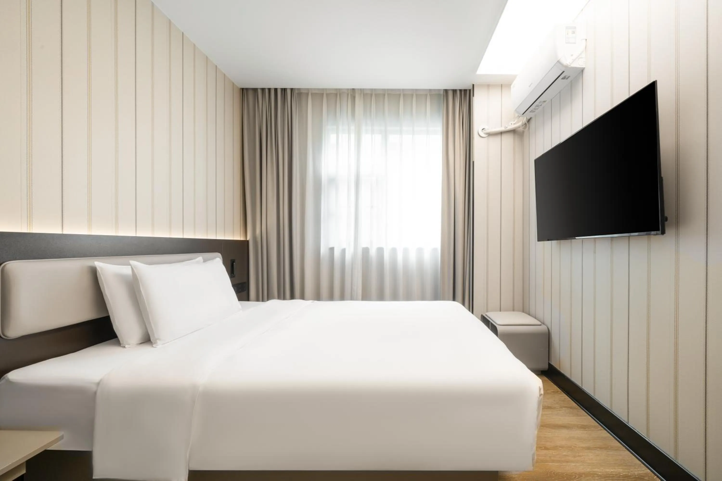 Bed in Hanting Hotel Shenzhen Coast City Nanyou Clothing City