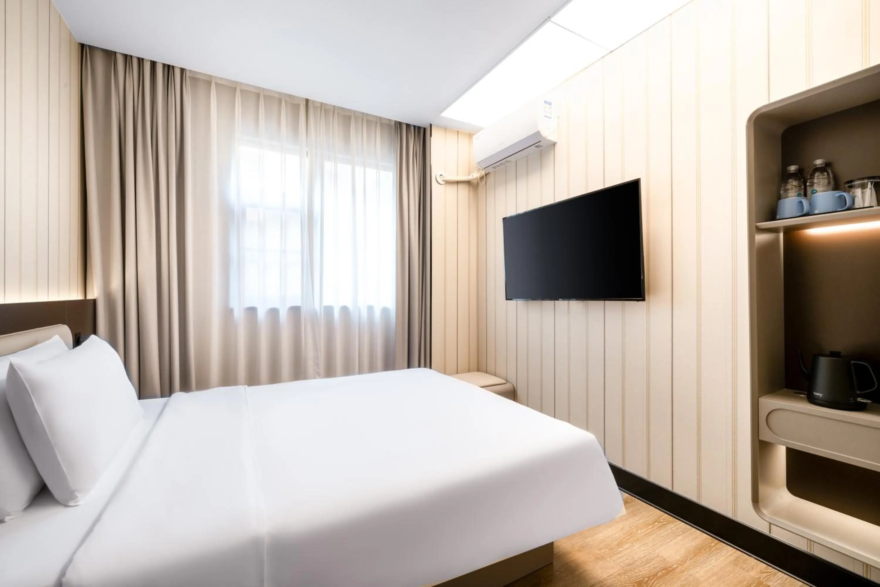 Bed in Hanting Hotel Shenzhen Coast City Nanyou Clothing City
