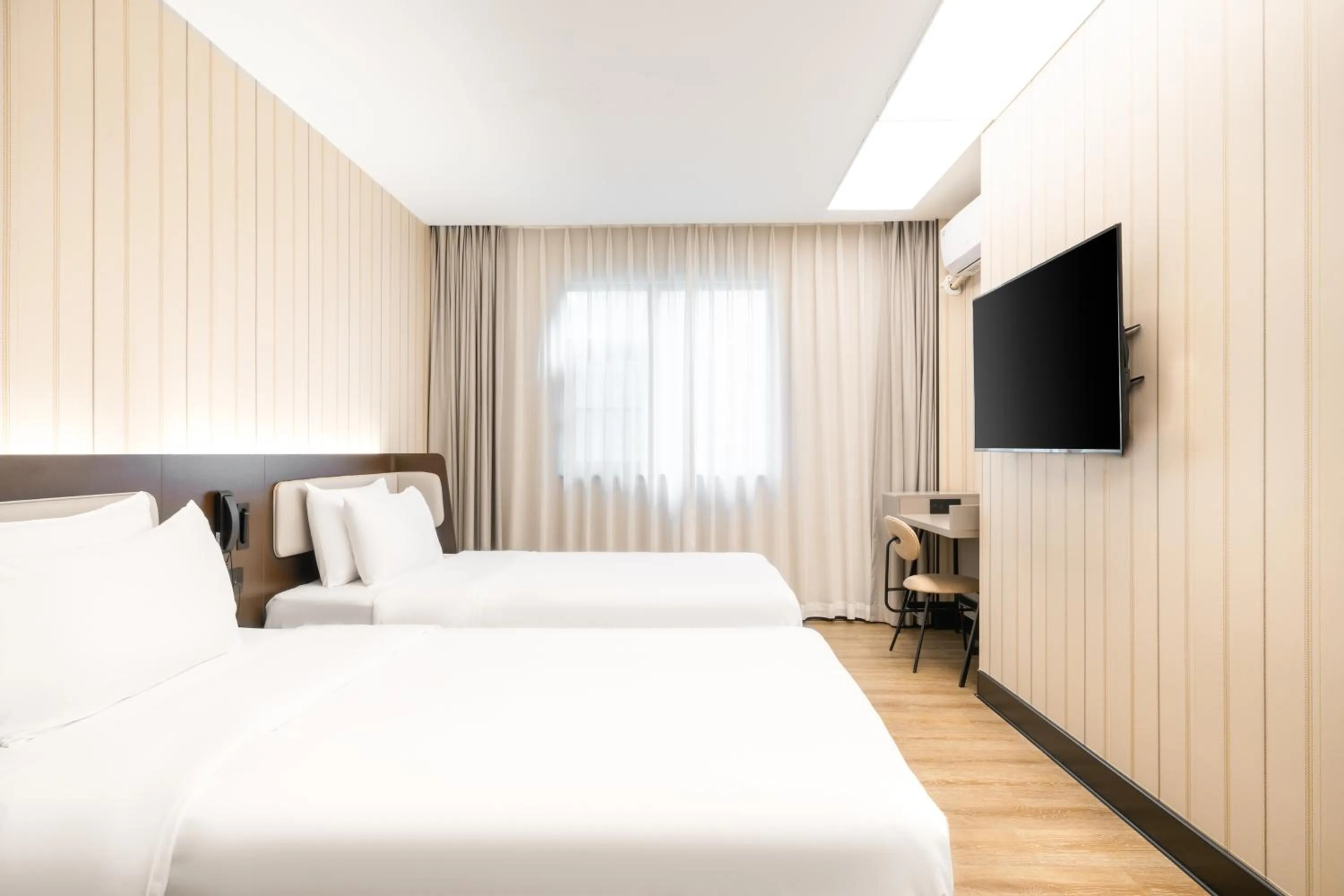 Bed in Hanting Hotel Shenzhen Coast City Nanyou Clothing City